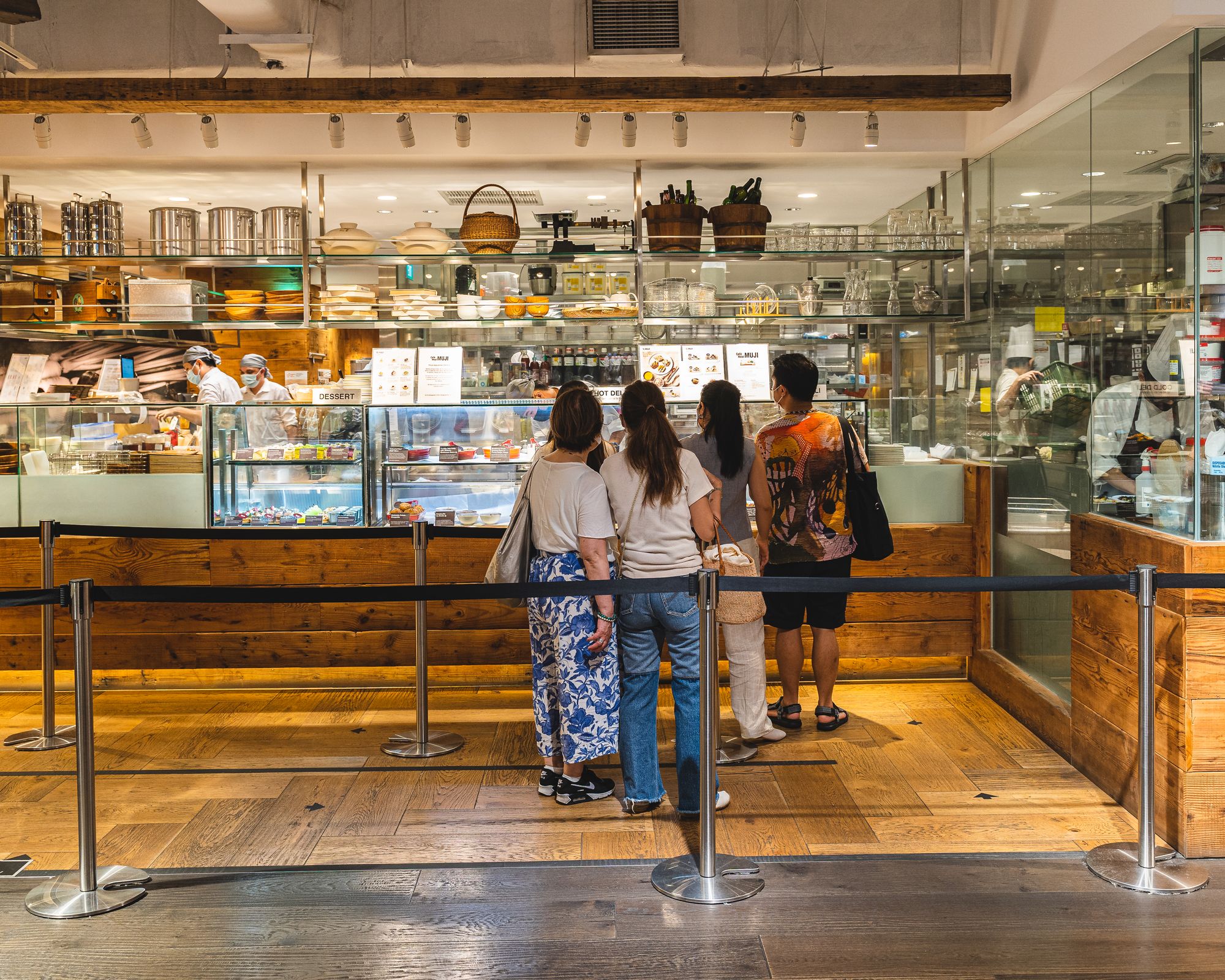 Wide shot of people lining up to order