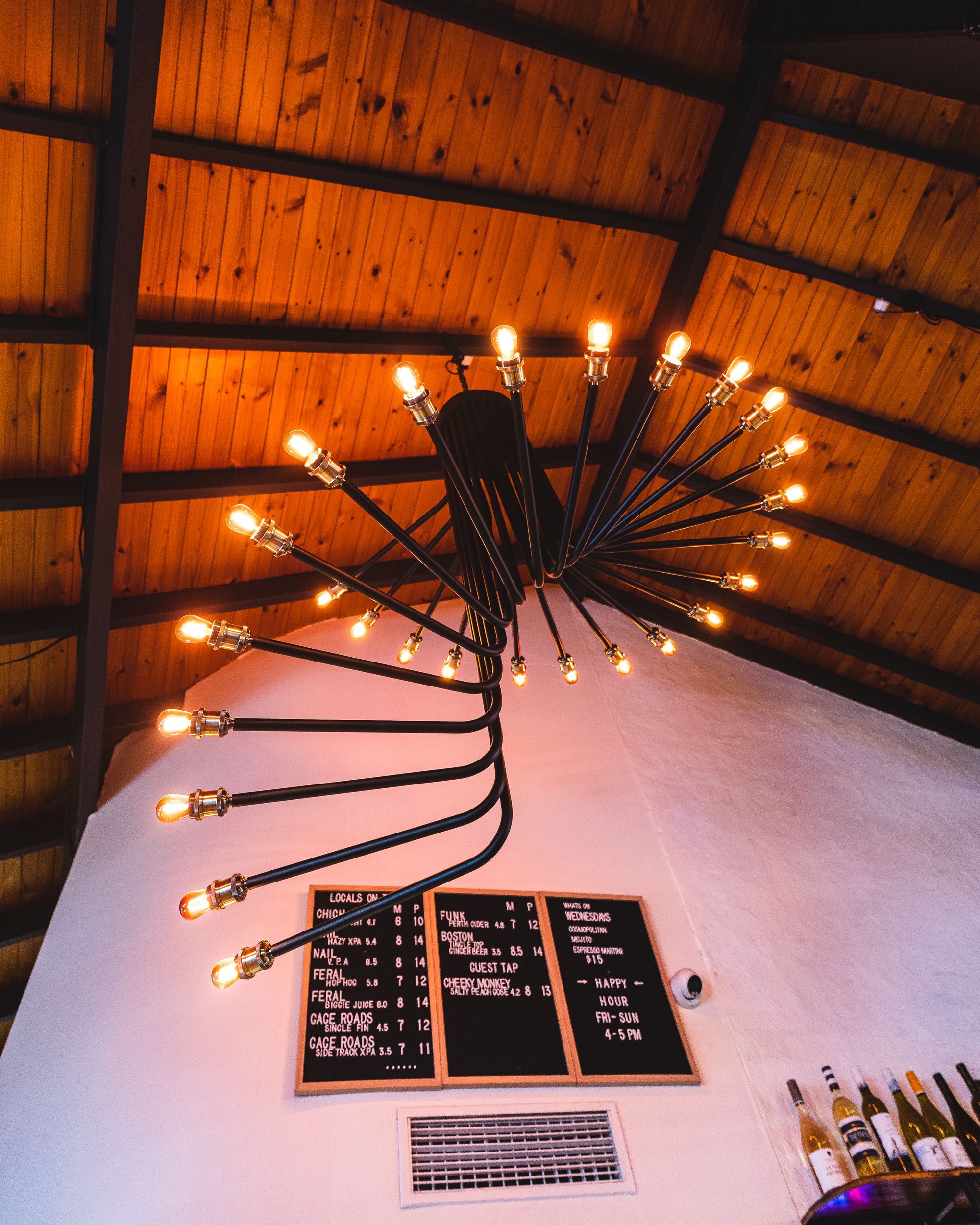 Upwards shot of a lighting fixture that fans out