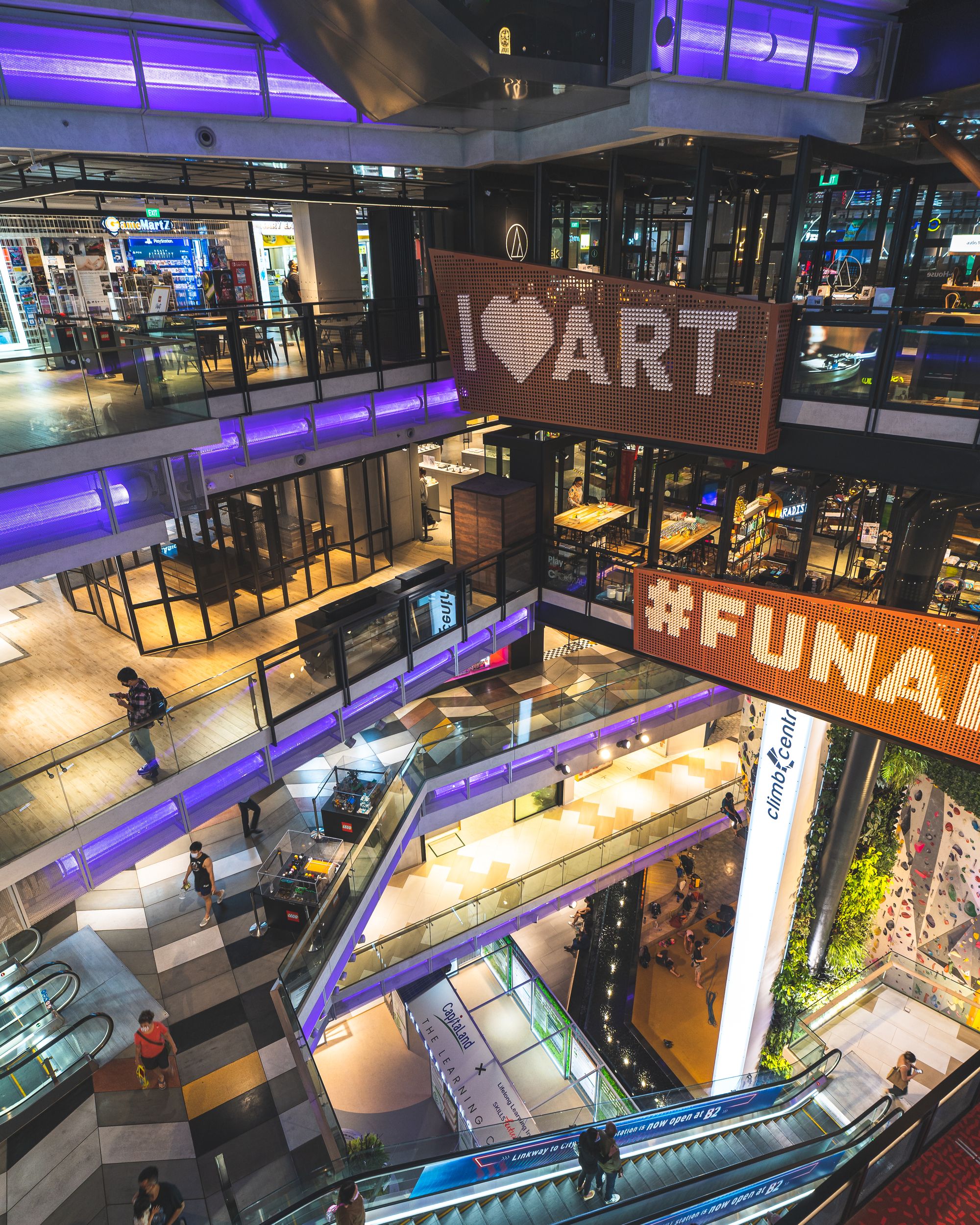 Interior of Funan mall, showing a number of floors and the indoor climbing all