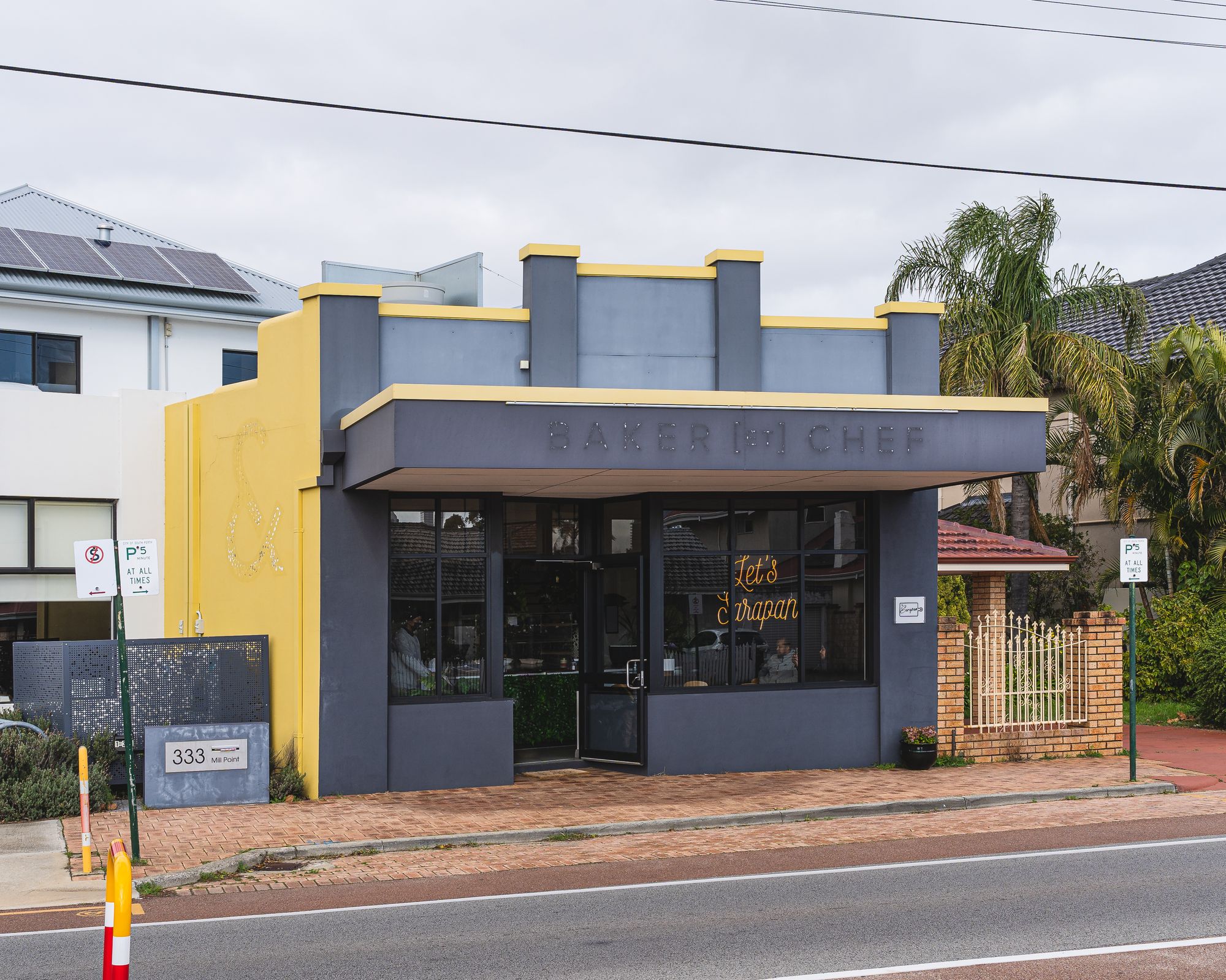 Exterior of The Sarapan, showing old signage from Baker et Chef