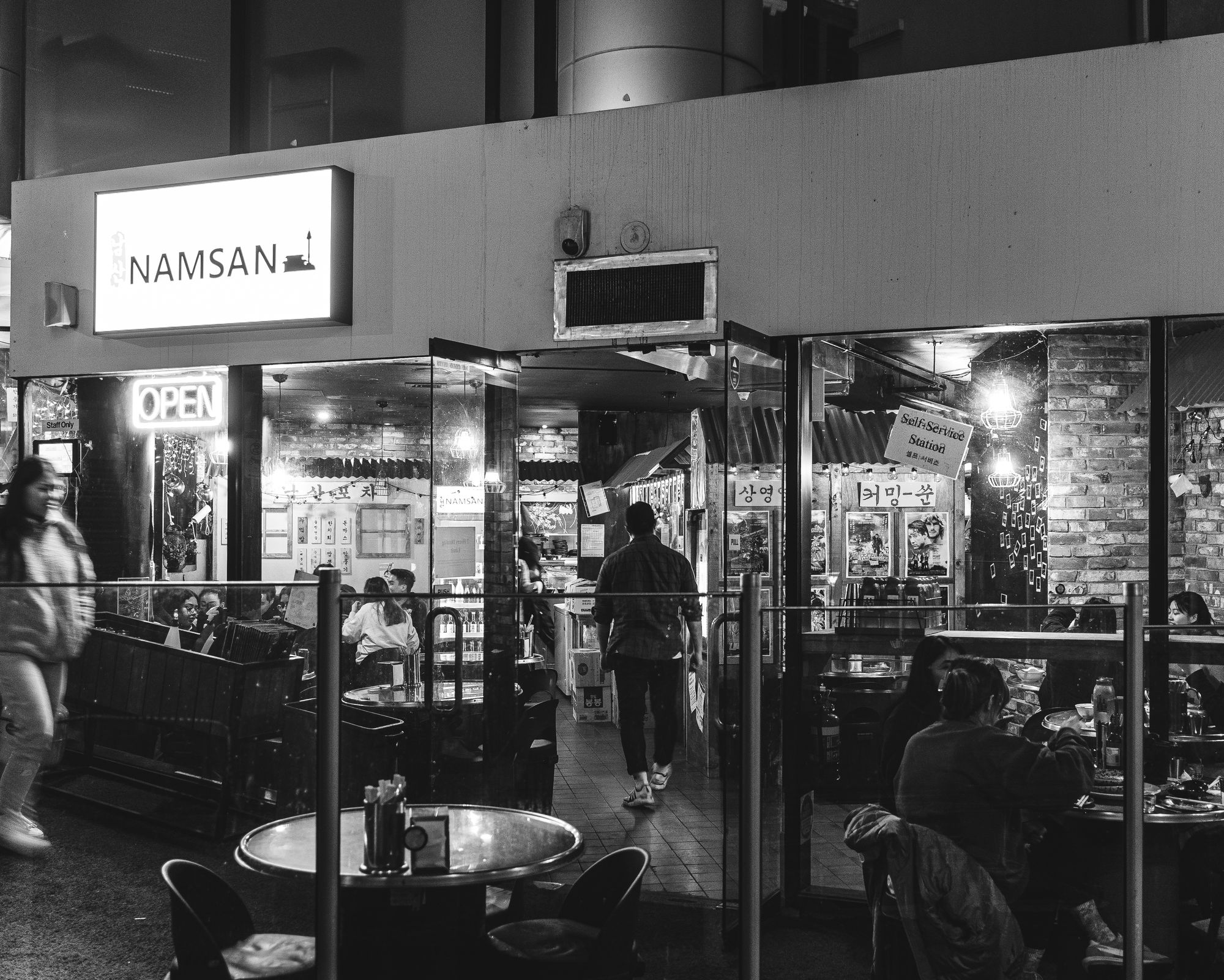 Black and white photo of the entrance into Namsan