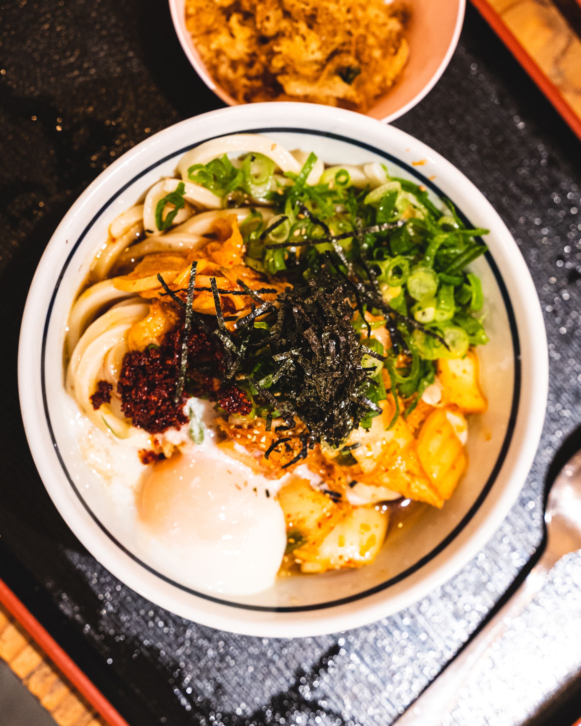 Top down shot of a bowl of udon