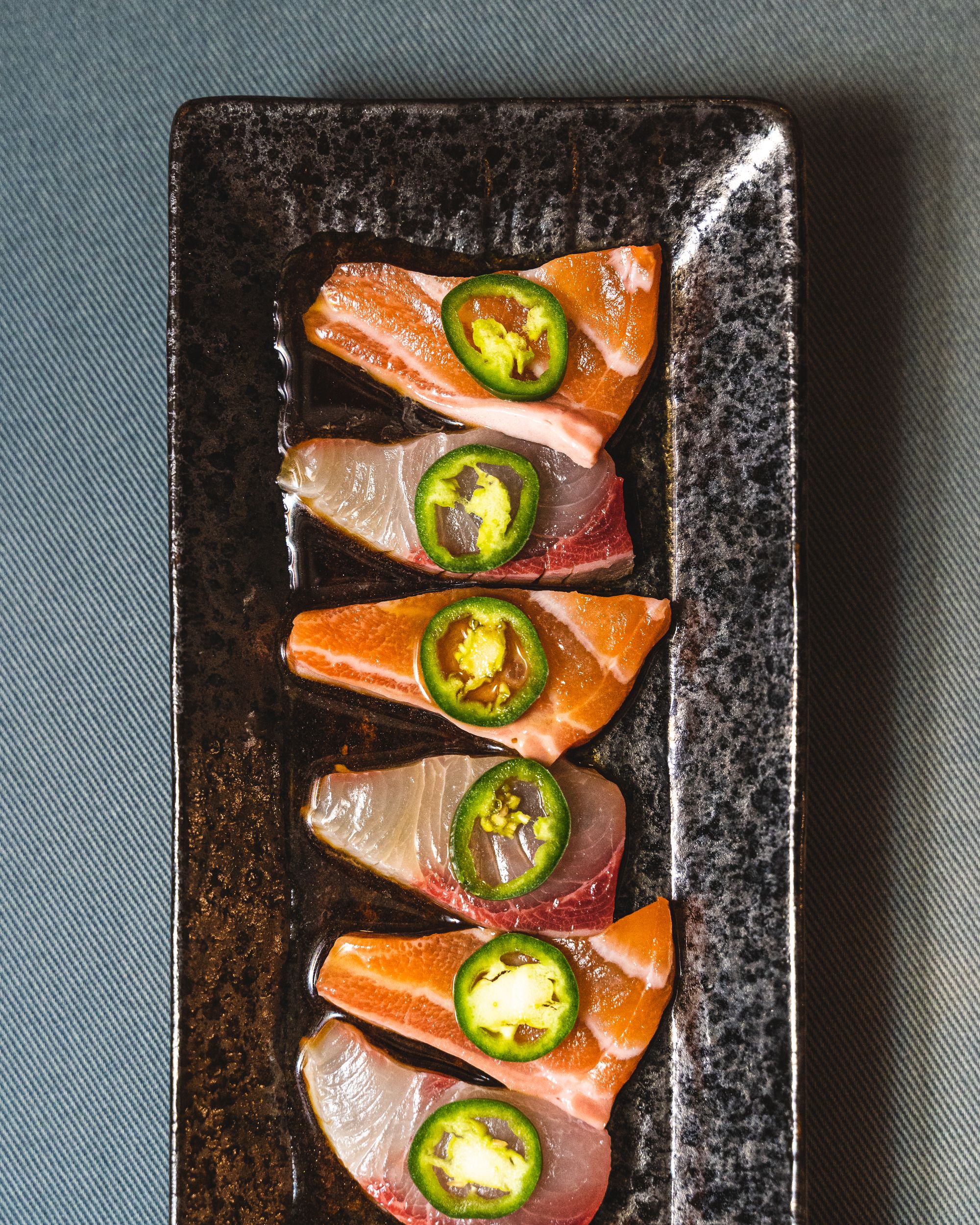 Close up of sashimi with chilli