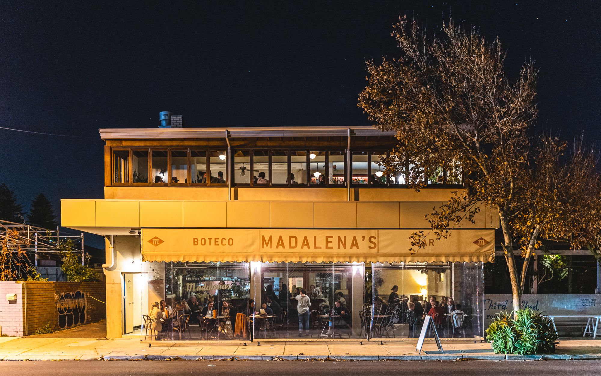 Exterior view of Madalena's at night