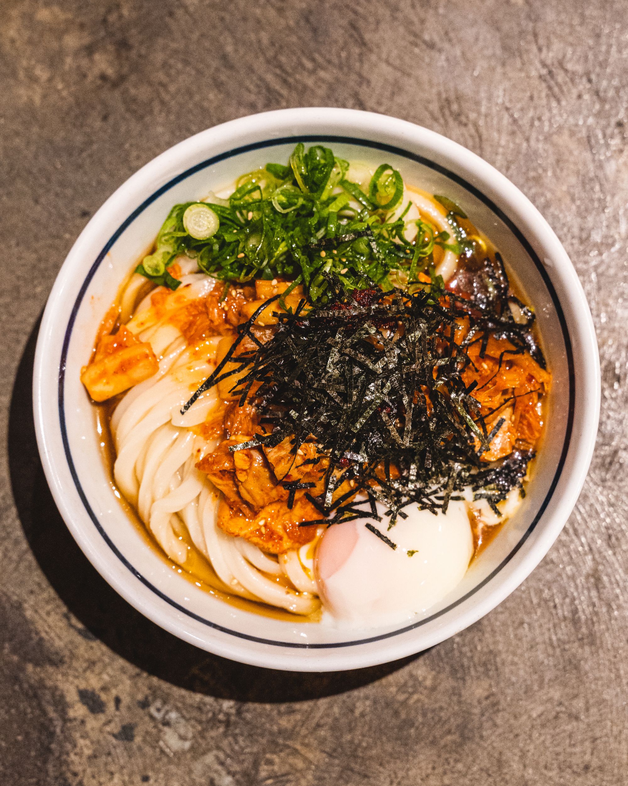 Top down shot of a bowl of udon