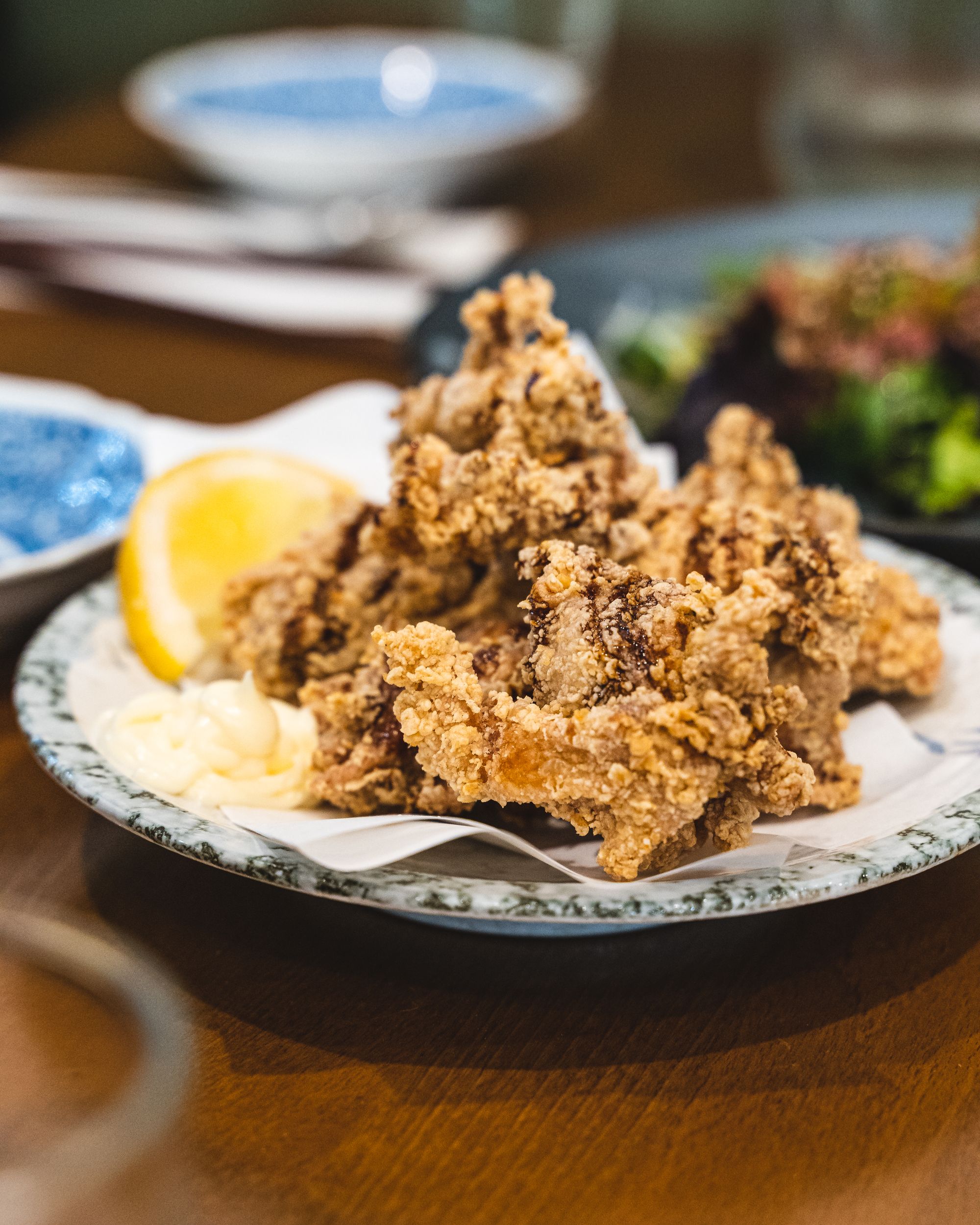 Close up of karaage chicken with kewpie mayo on the side