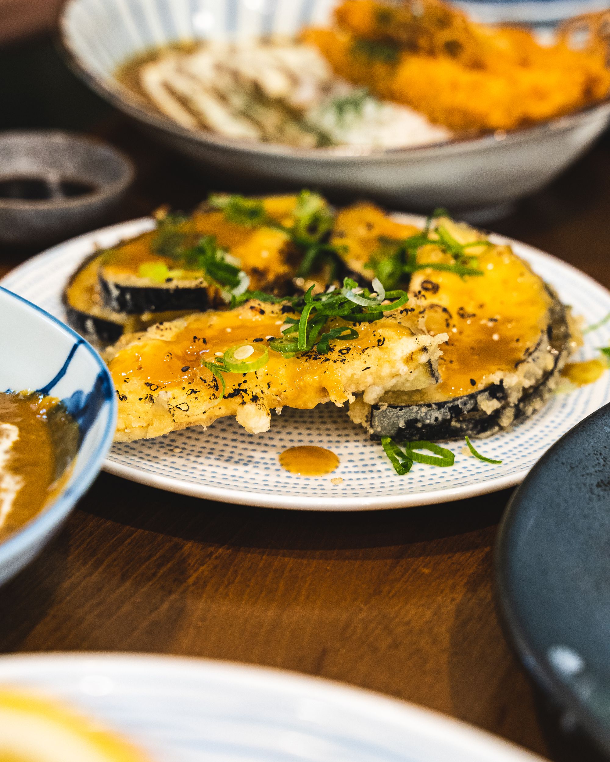 Fried eggplant with miso sauce on a plate