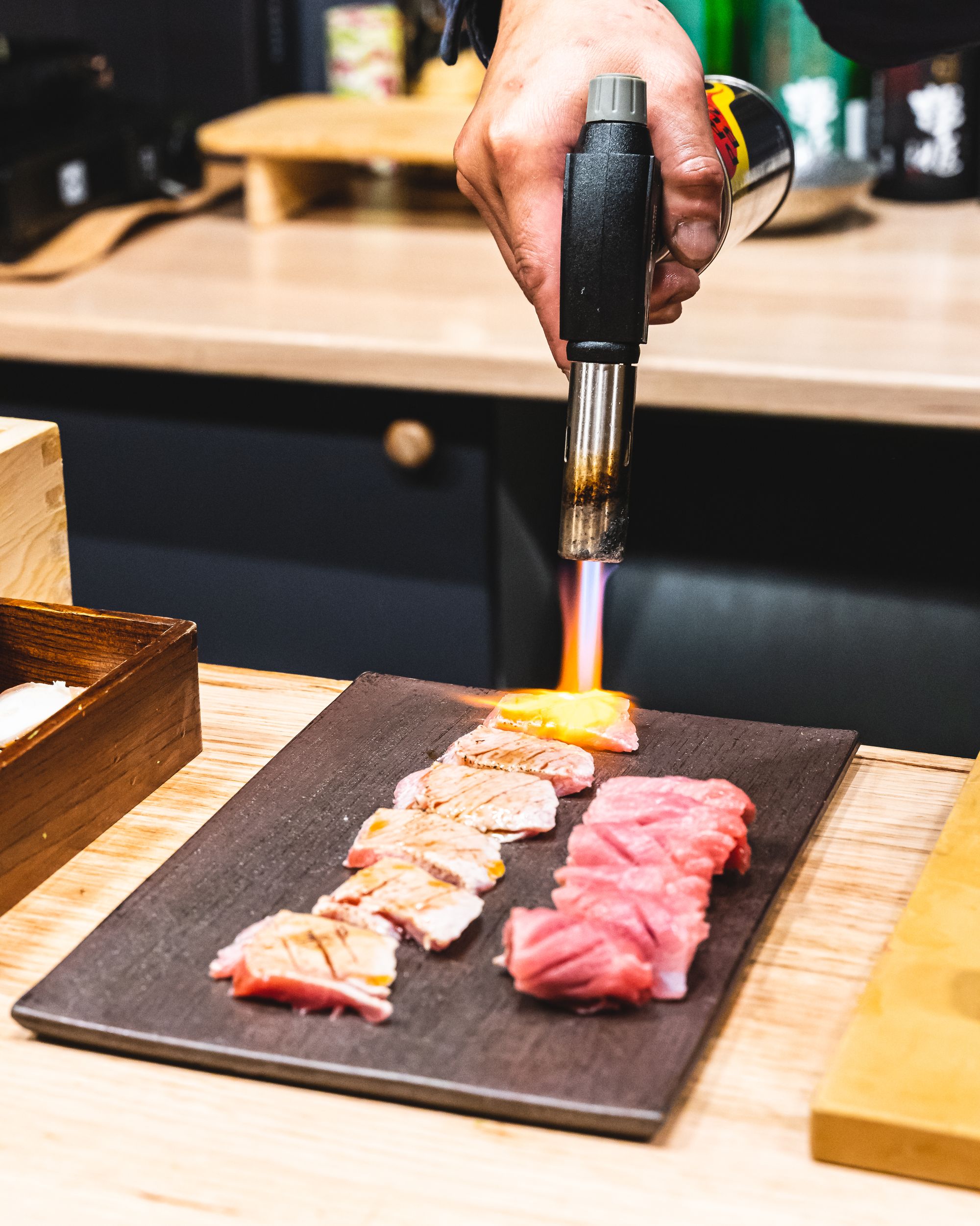 Blow-torch searing the wagyu