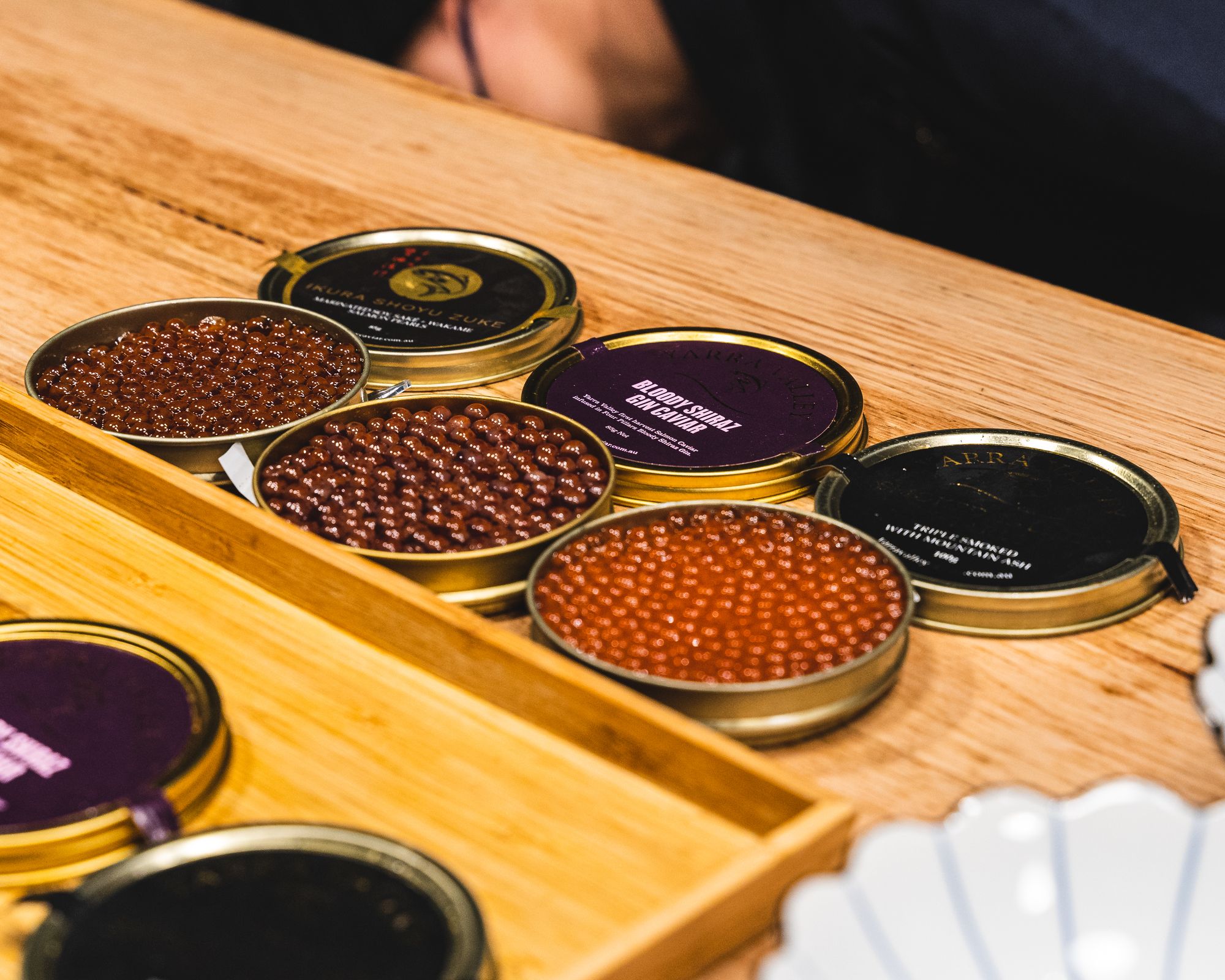 Close up of caviar tins