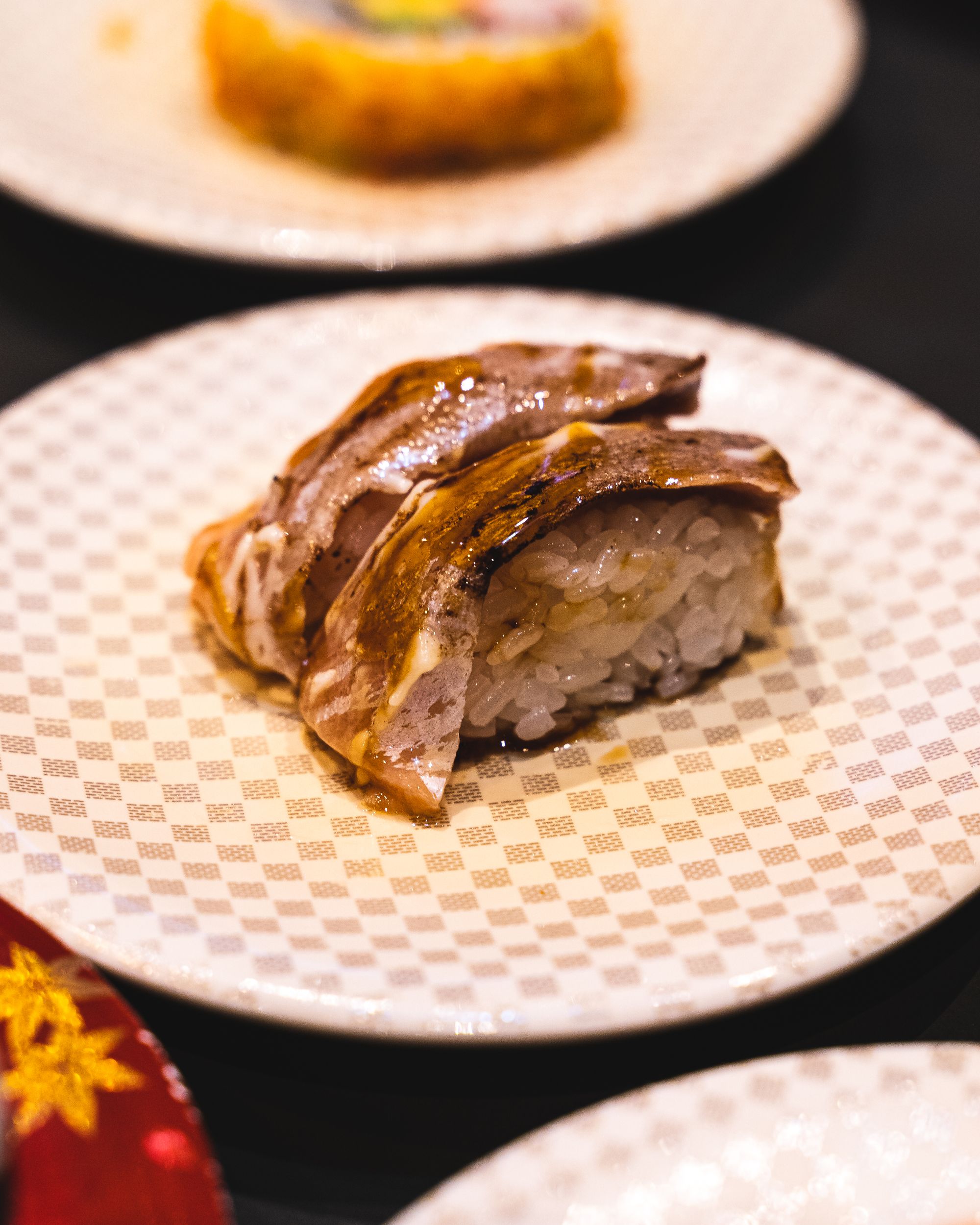 Close up of aburi horse mackerel nigiri