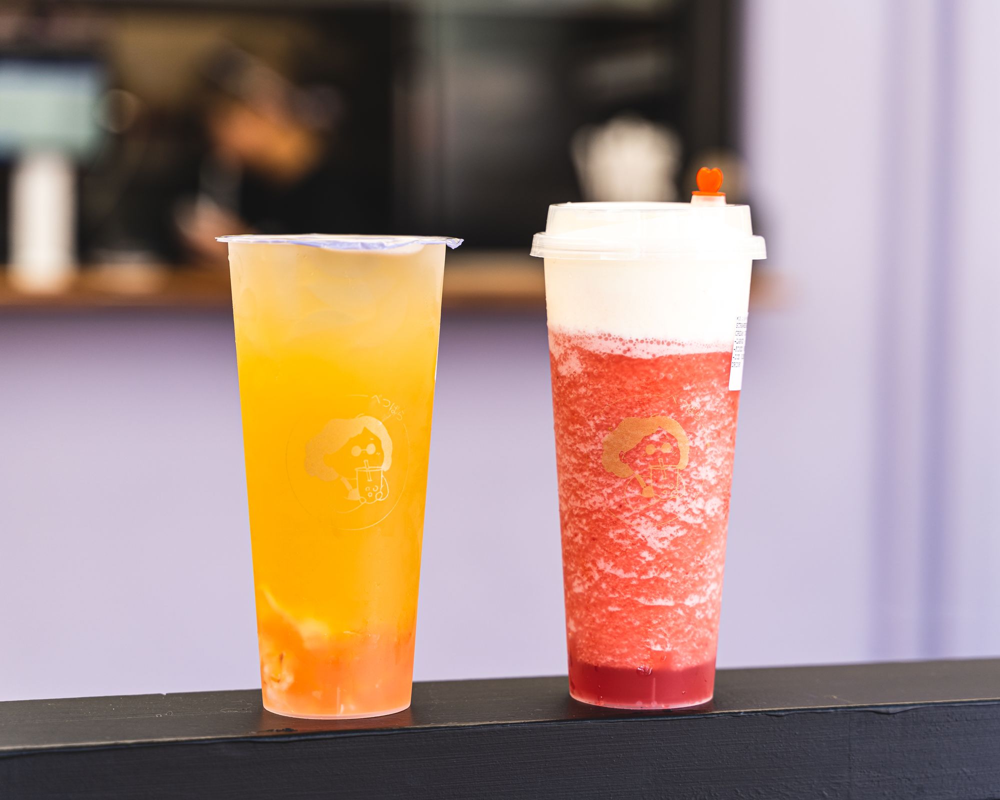 Close up of two bubble tea drinks 