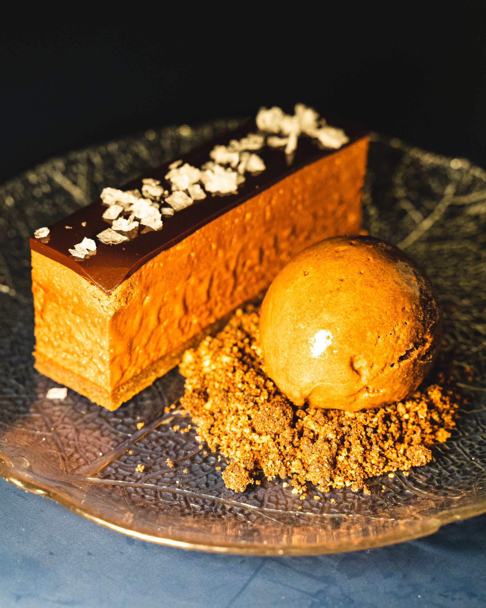 Close up of chocolate pave with sorbet on the side