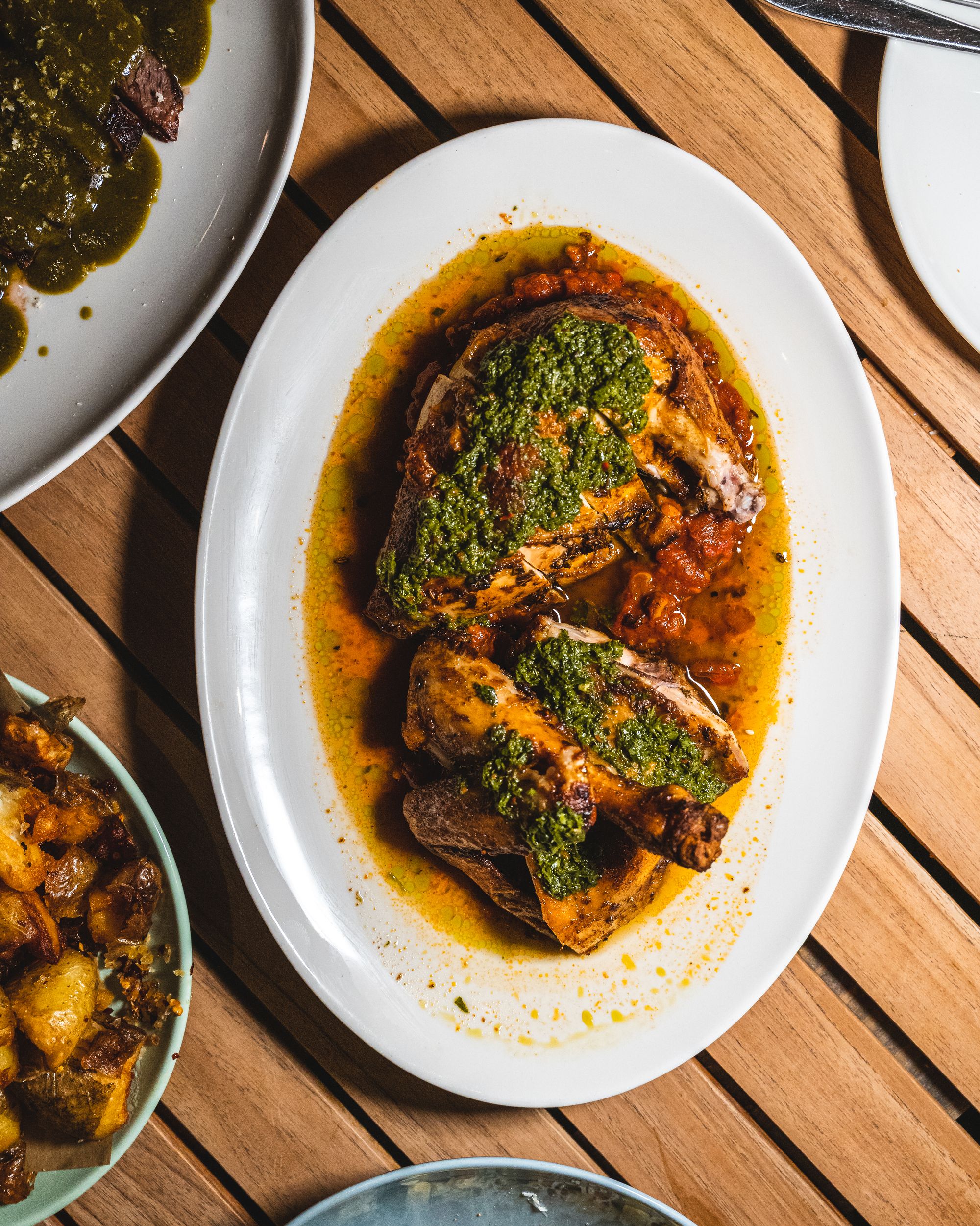 Top down shot of chicken on an oval plate