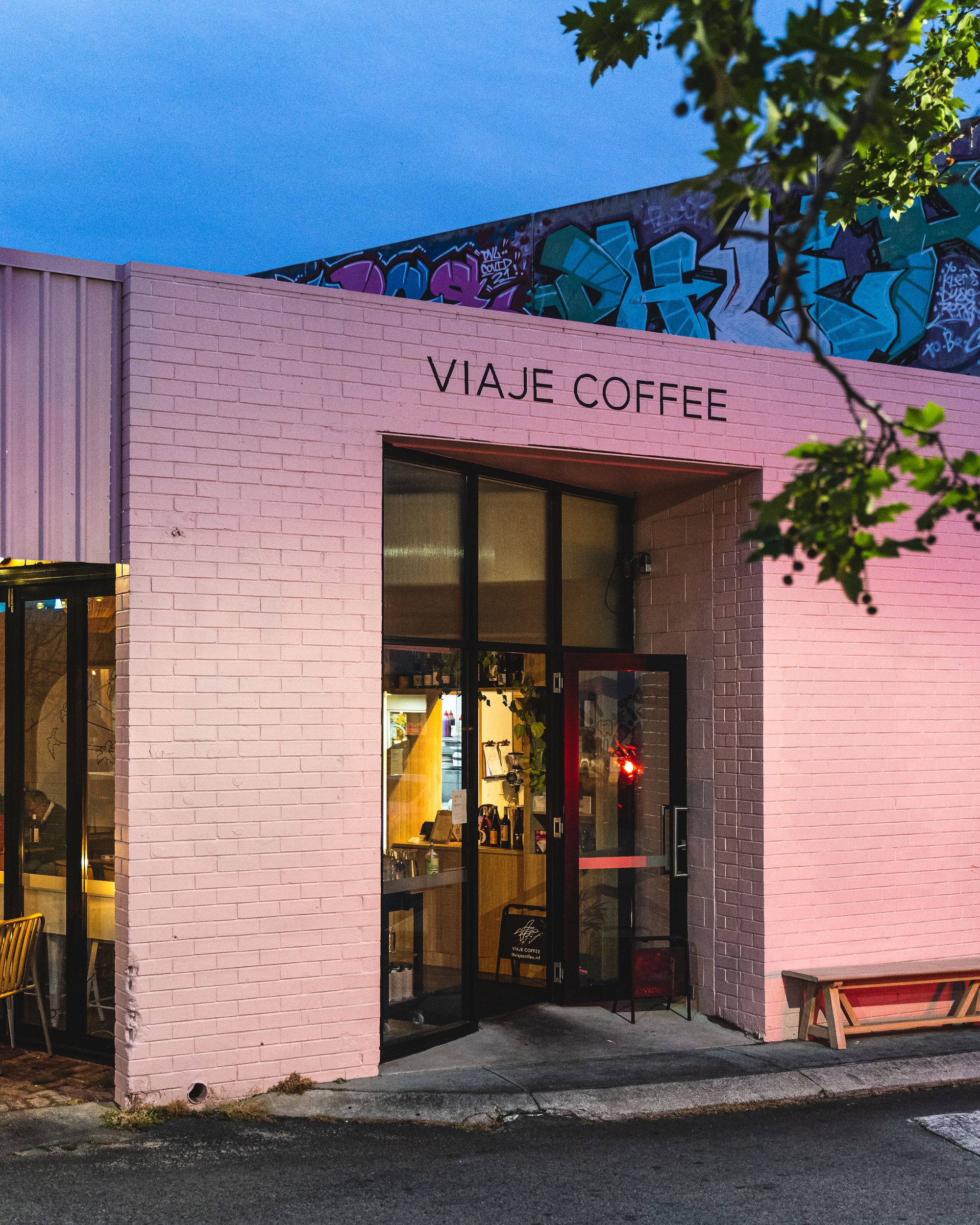 Exterior of Viaje showing pink painted wall