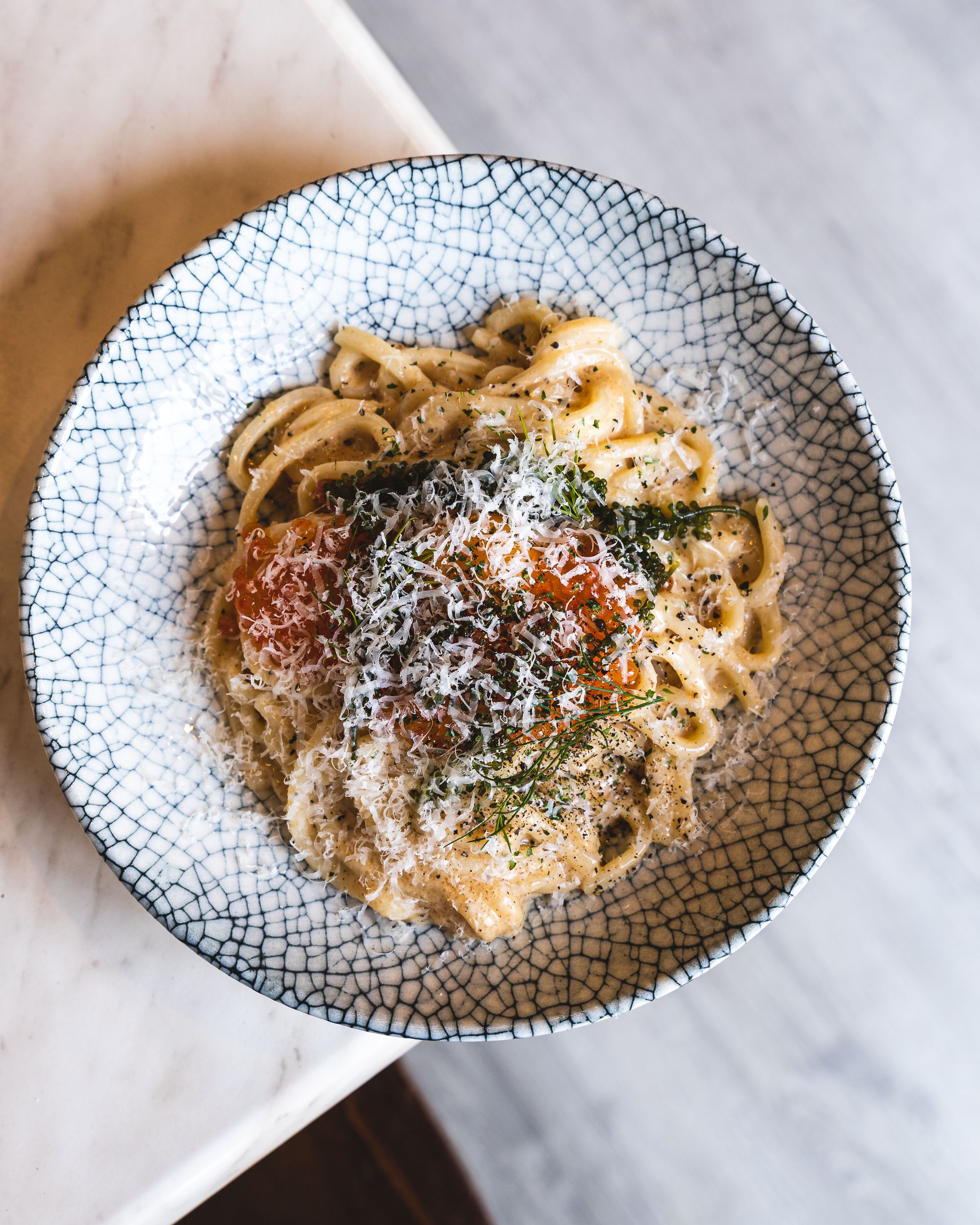 Overhead shot of pasta with salmon roe