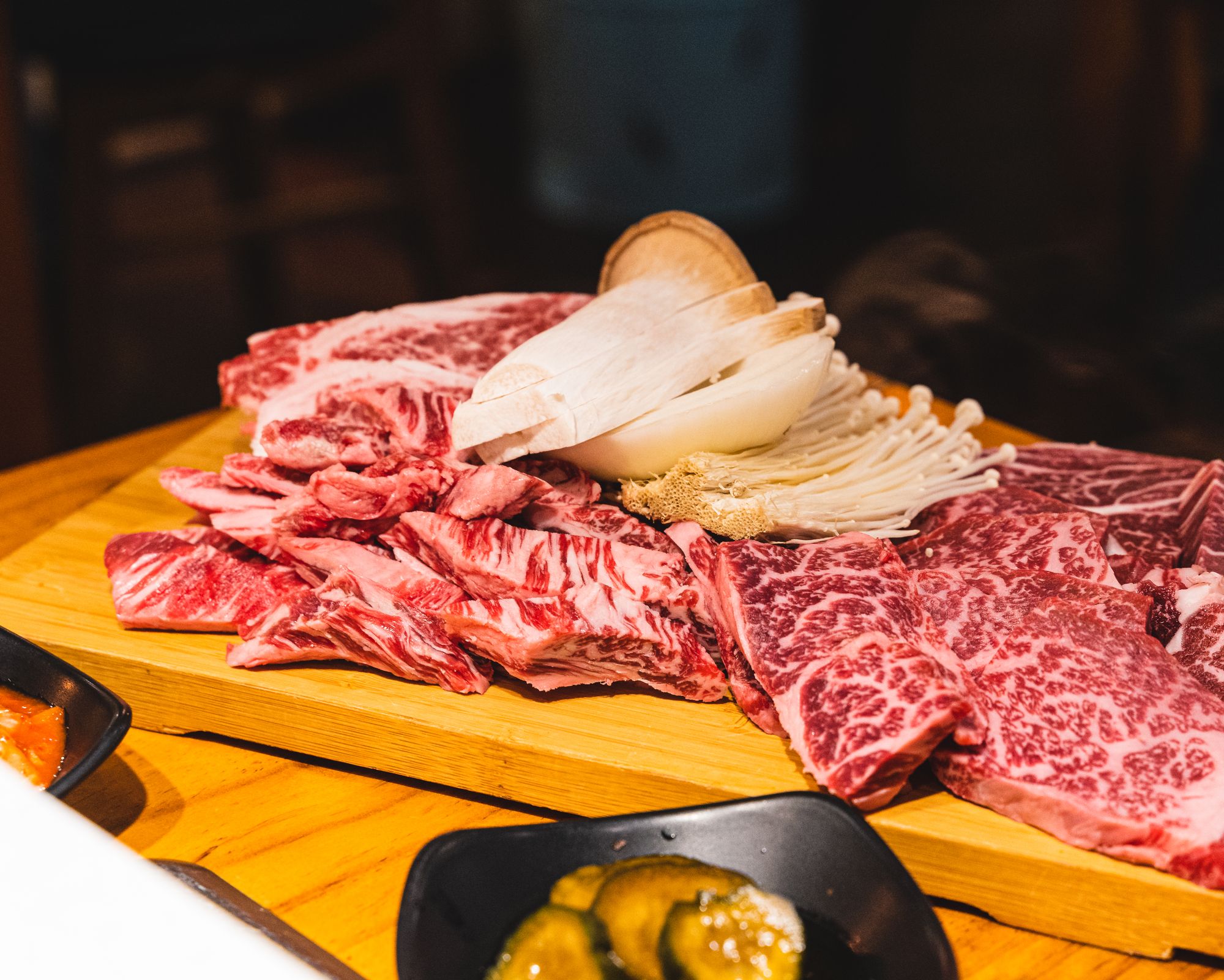 Close up plate of wagyu showing marbling