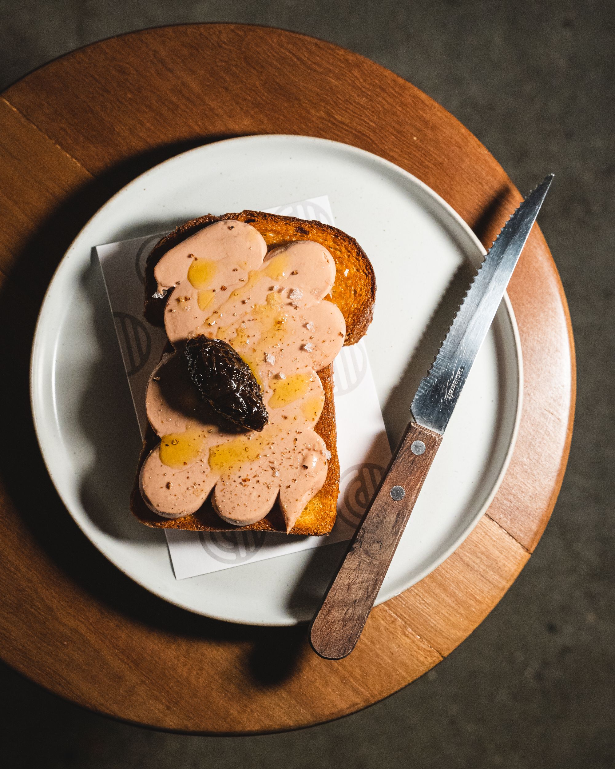 Top down of toast with duck liver parfair