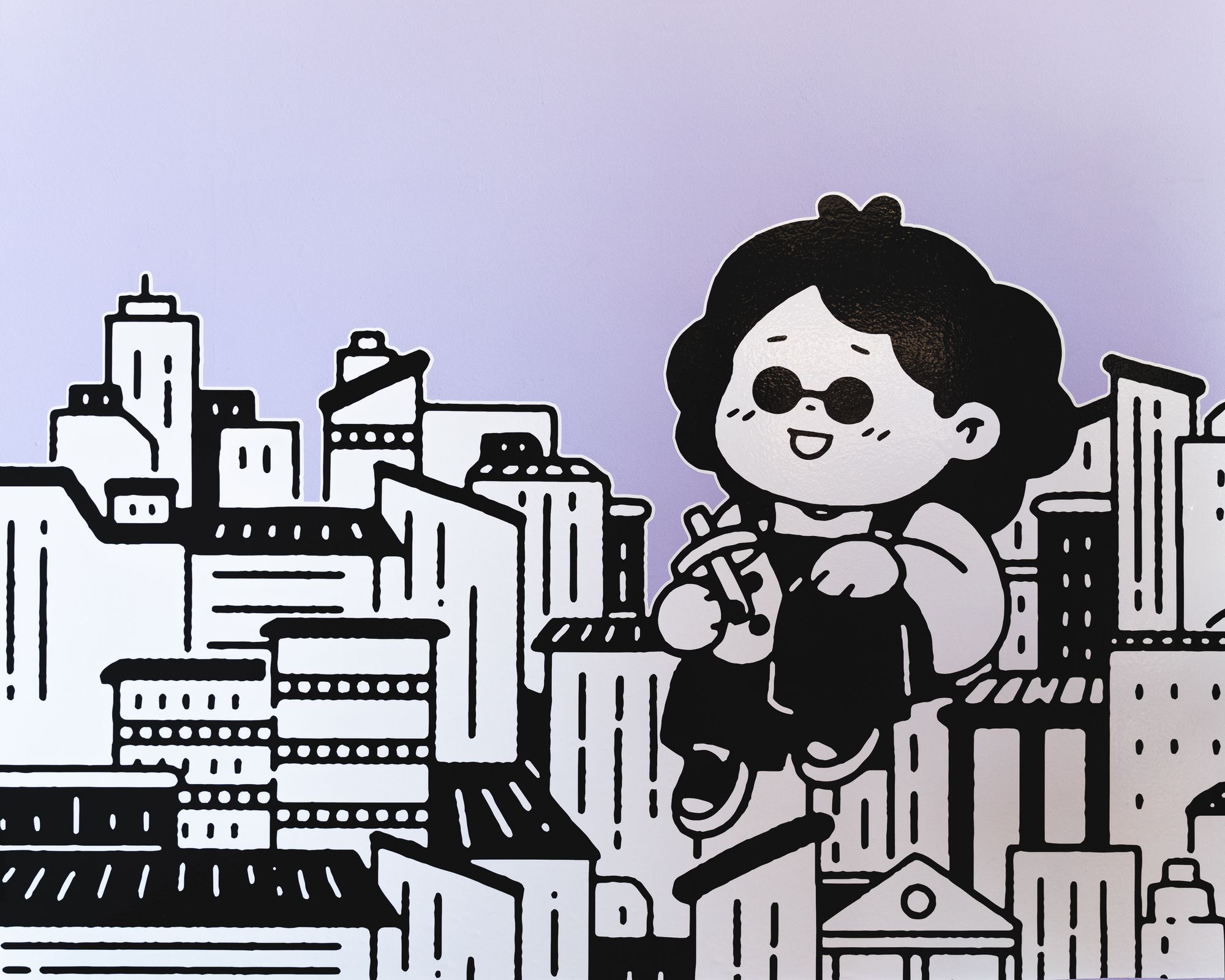 Japanese cartoon character sitting on a cartoon city sky line