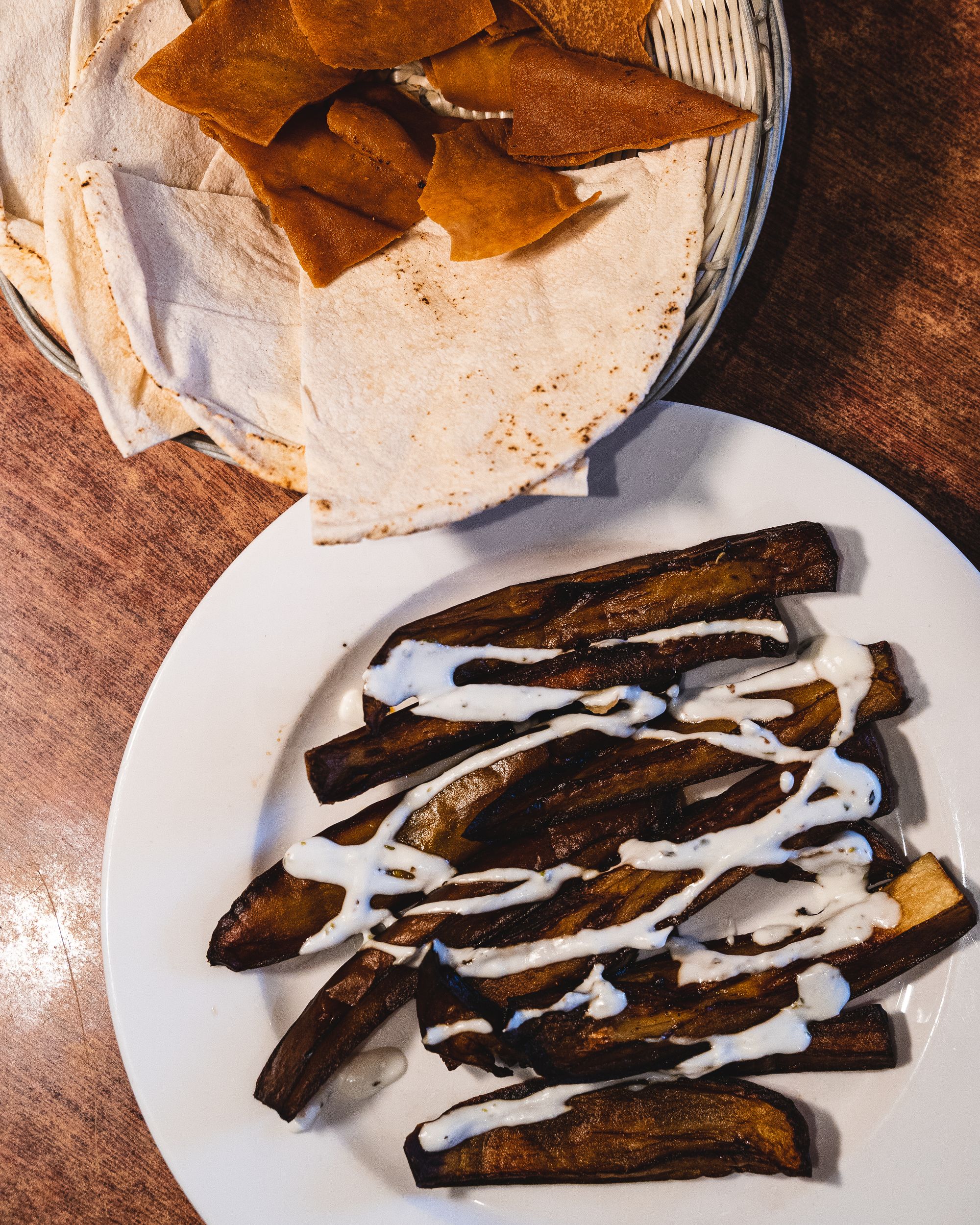 Fried eggplant served with yoghurt