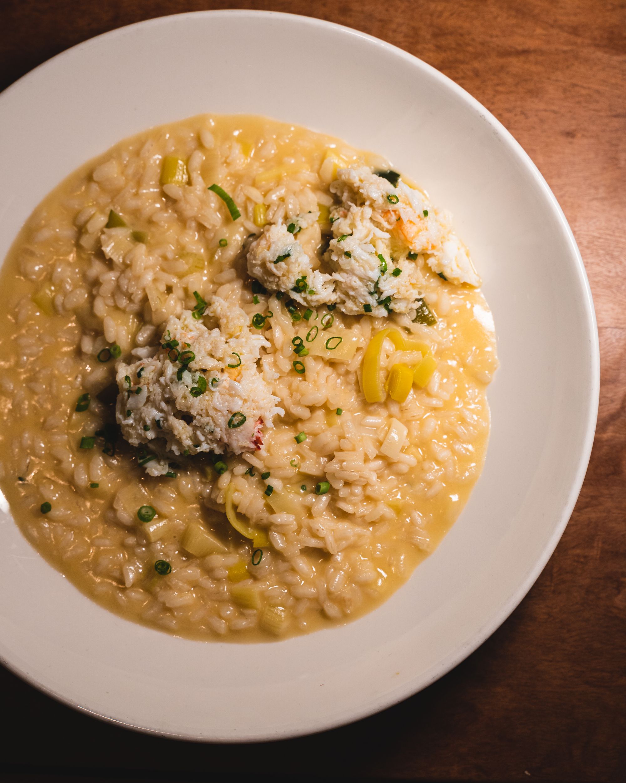 Top down shot of risotto with swimmer crab