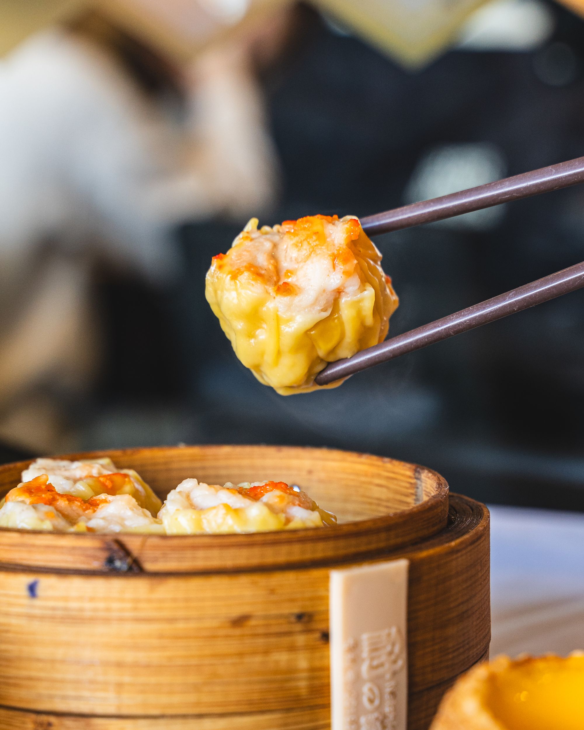 Chopstick holding a shumai