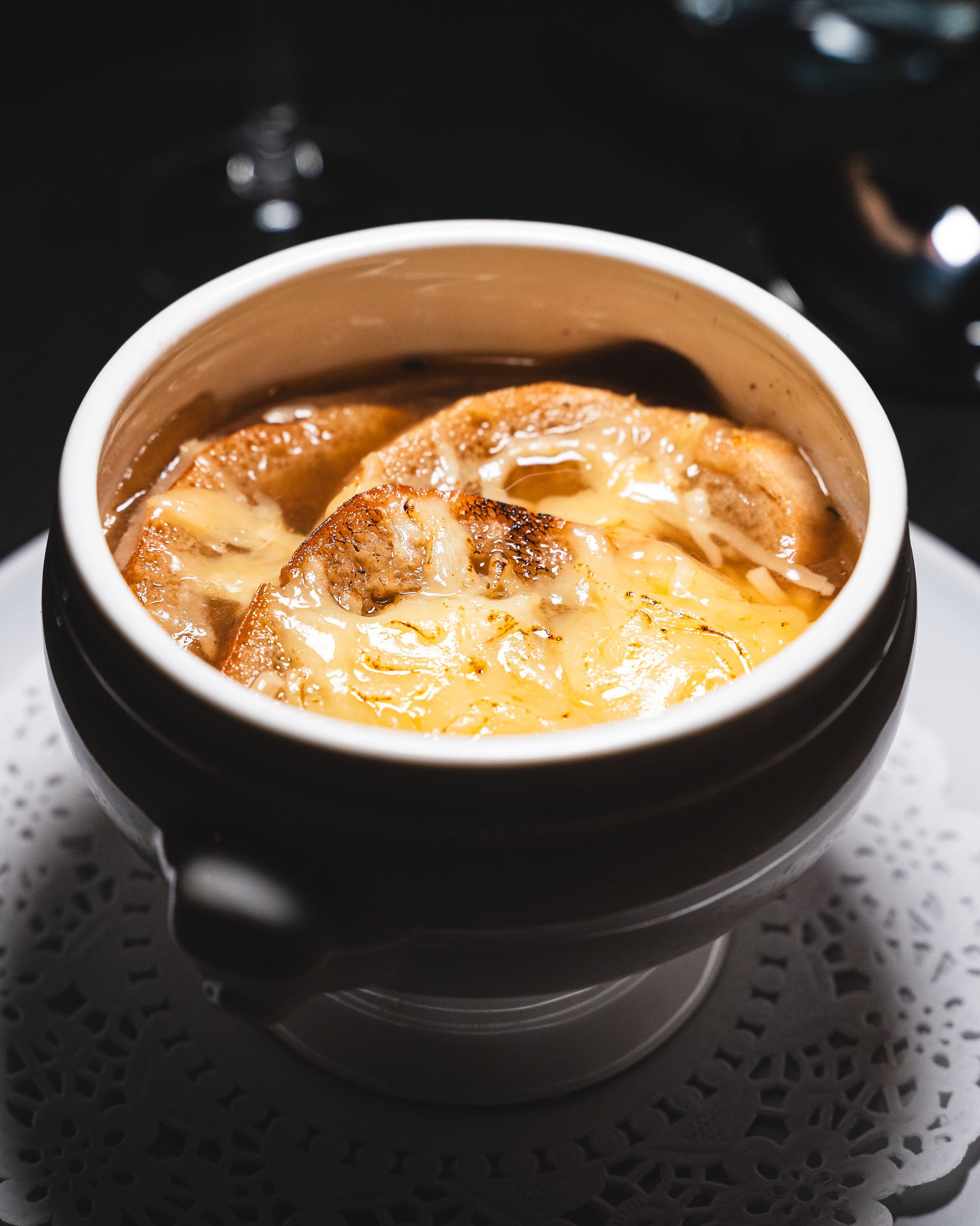 Close up of French onion soup in a bowl