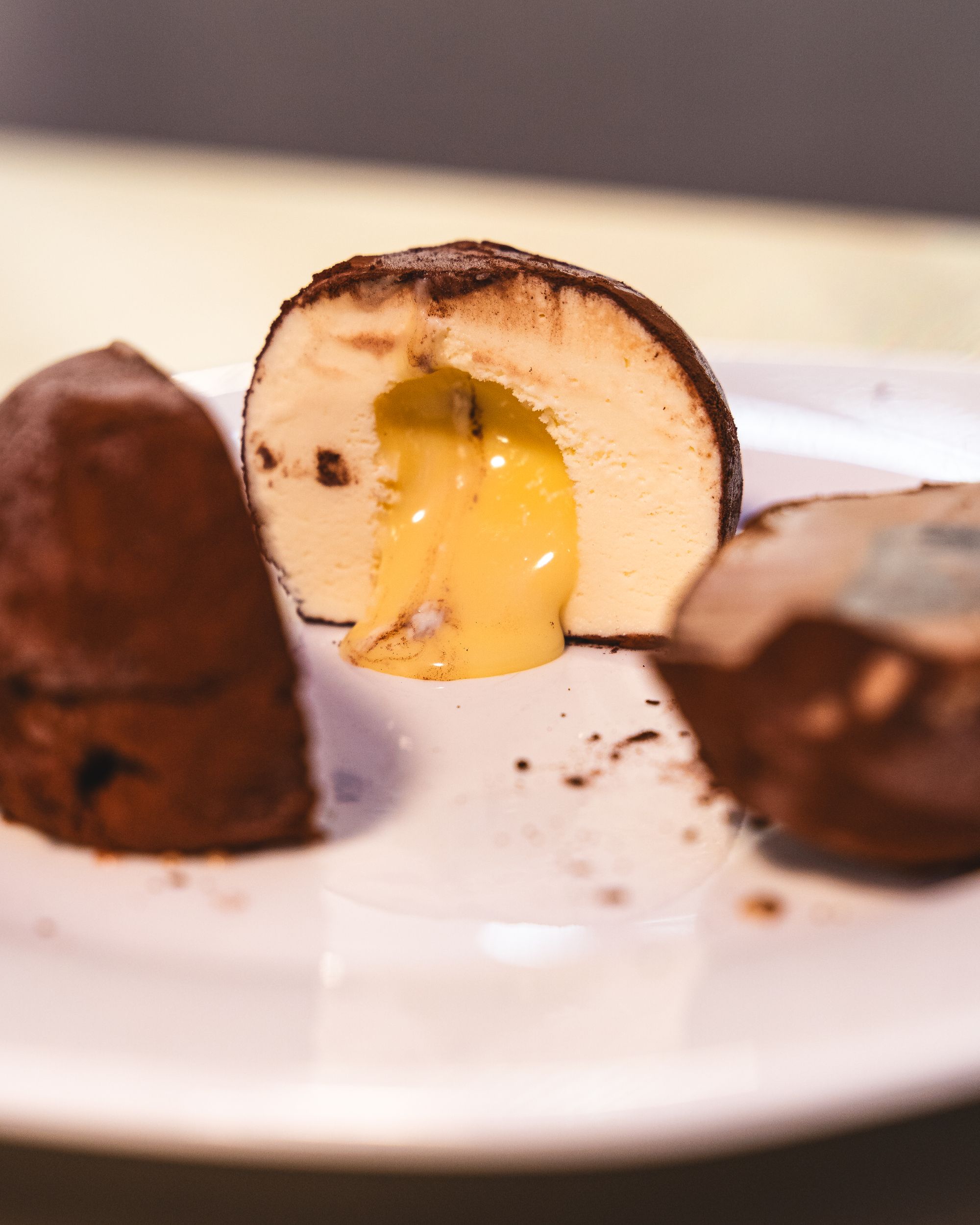 Close up of a tartufo oozing with cream