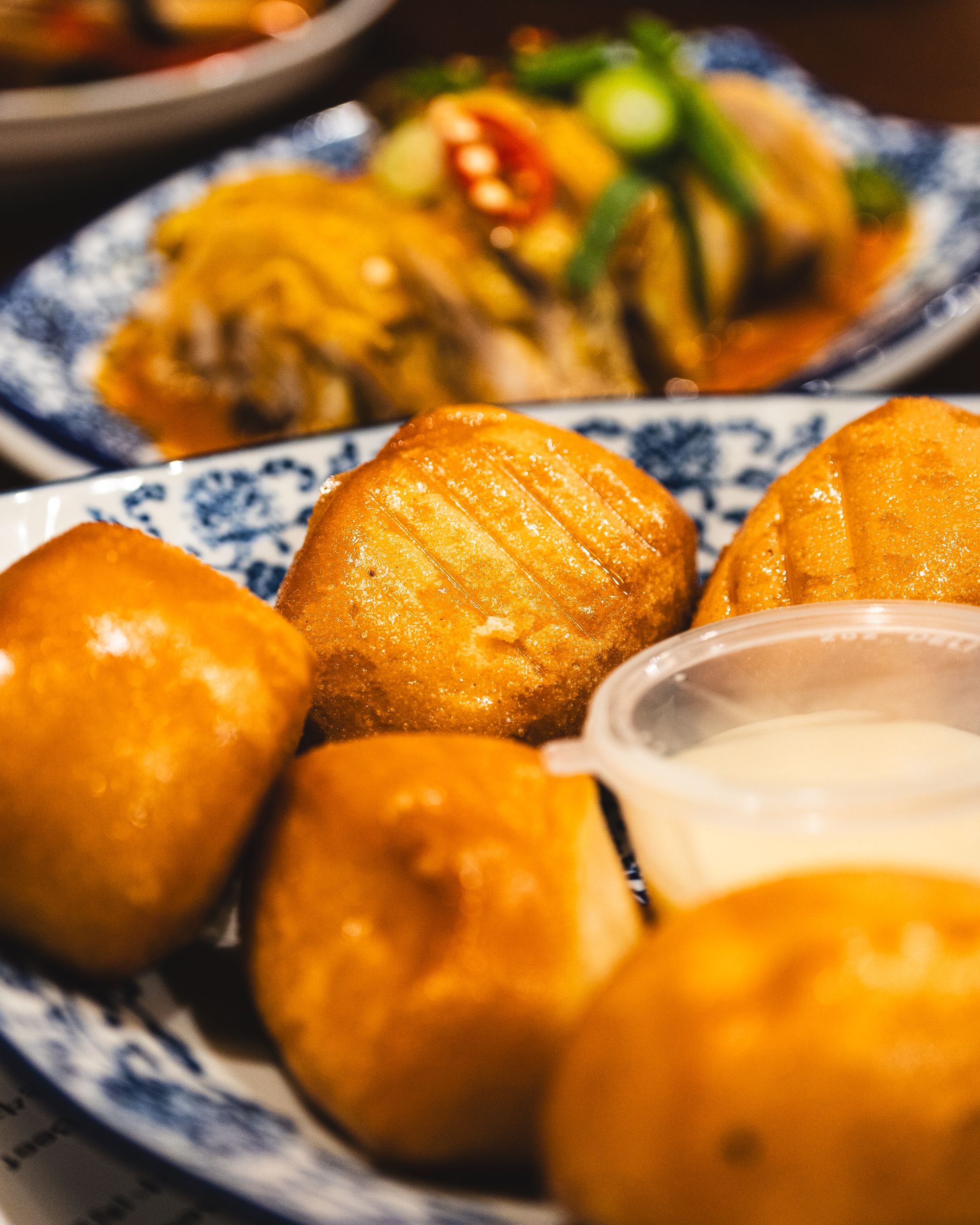 Close up of fried mantou with condensed milk