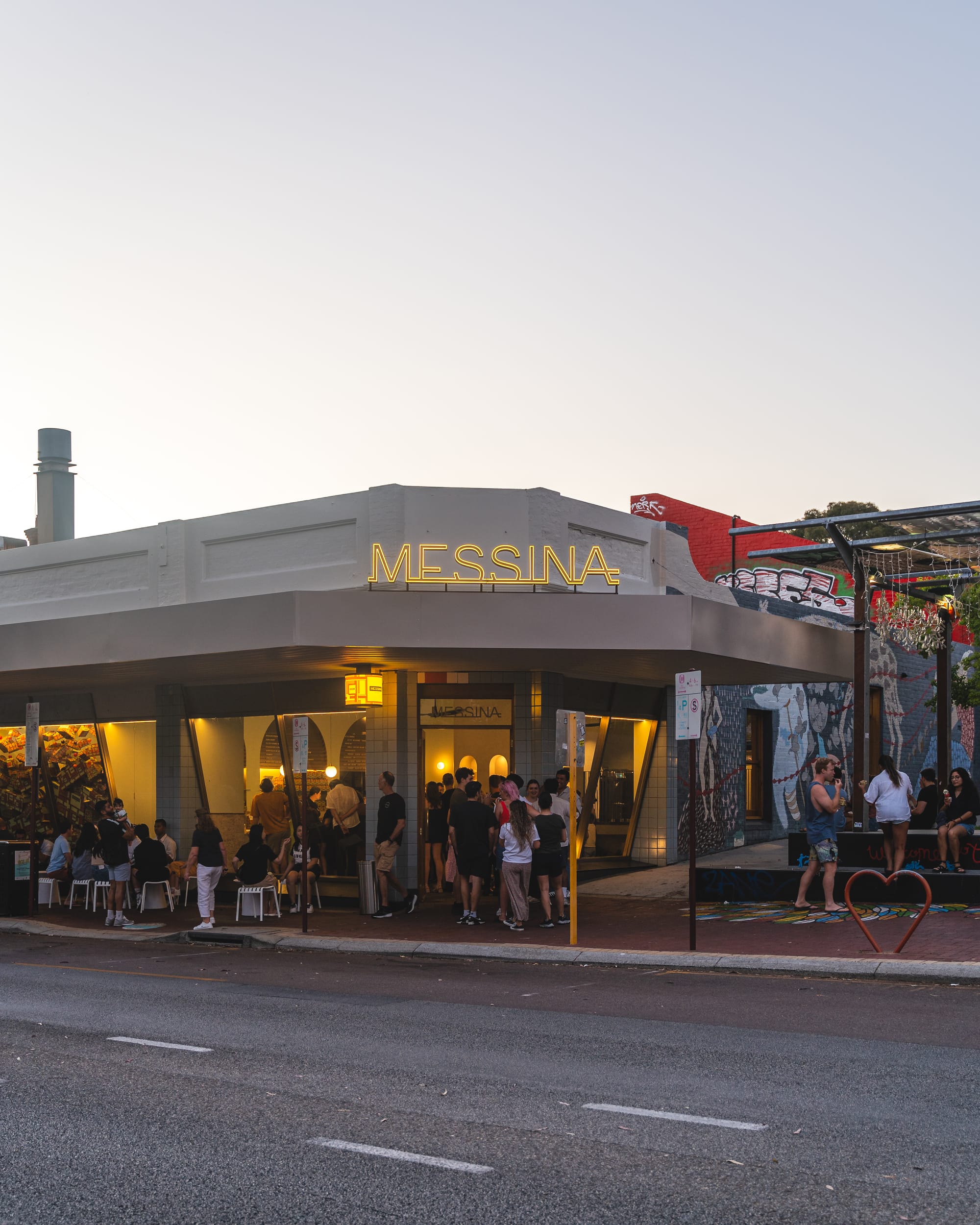 Exterior of Gelato Messina showing people lining up to go in