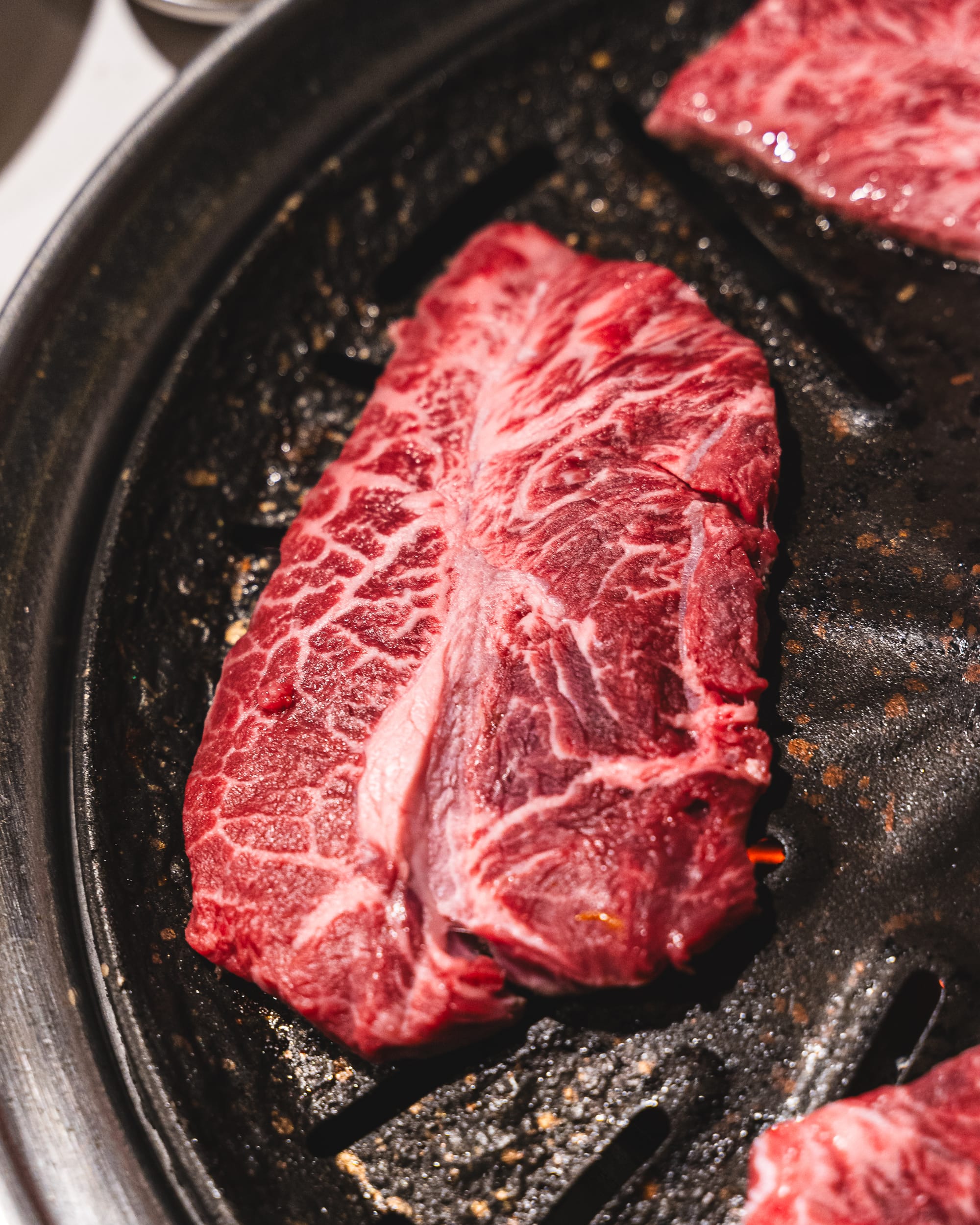 Close up of a raw slice of high marbling wagyu