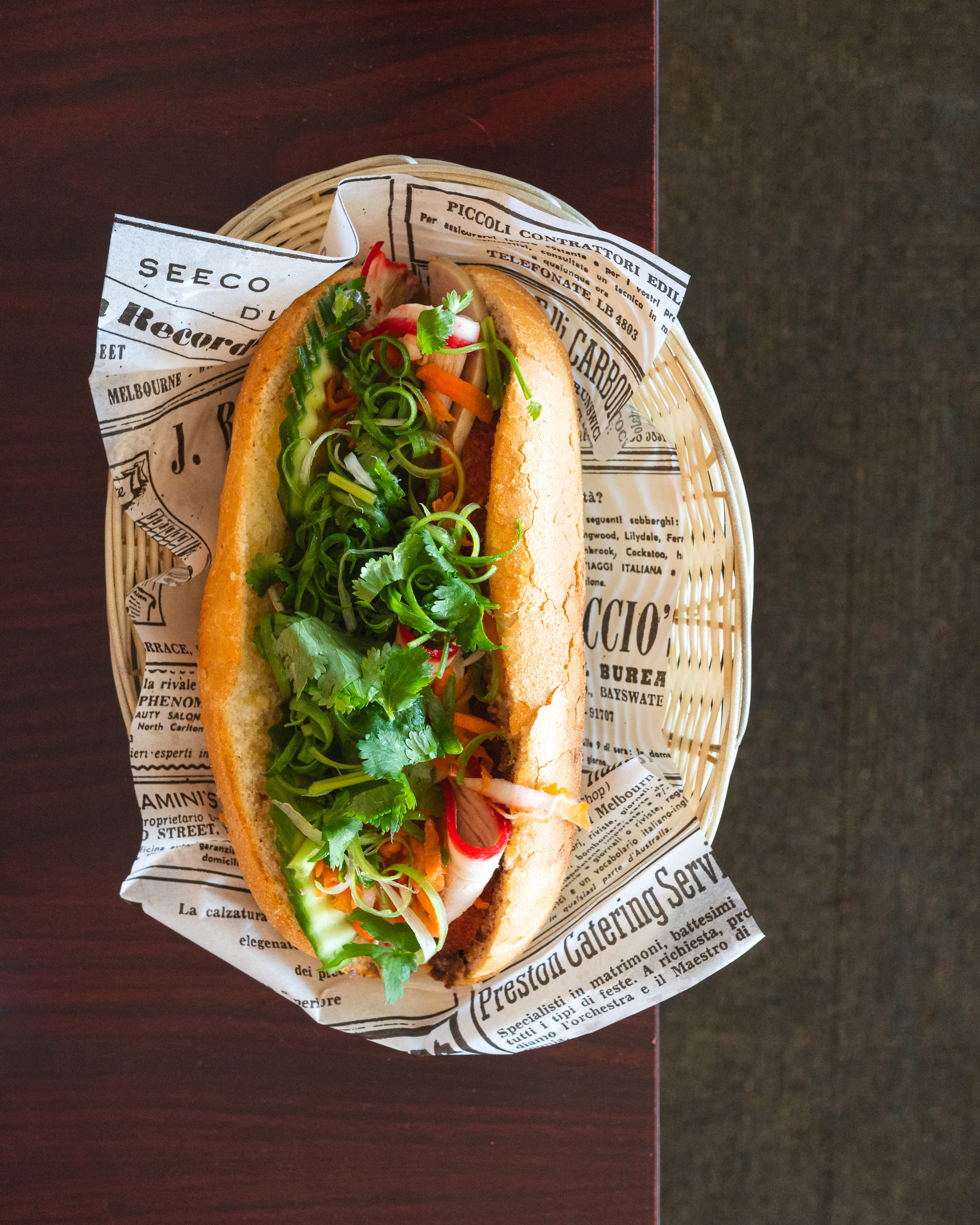 Top down shot of banh mi with garnish