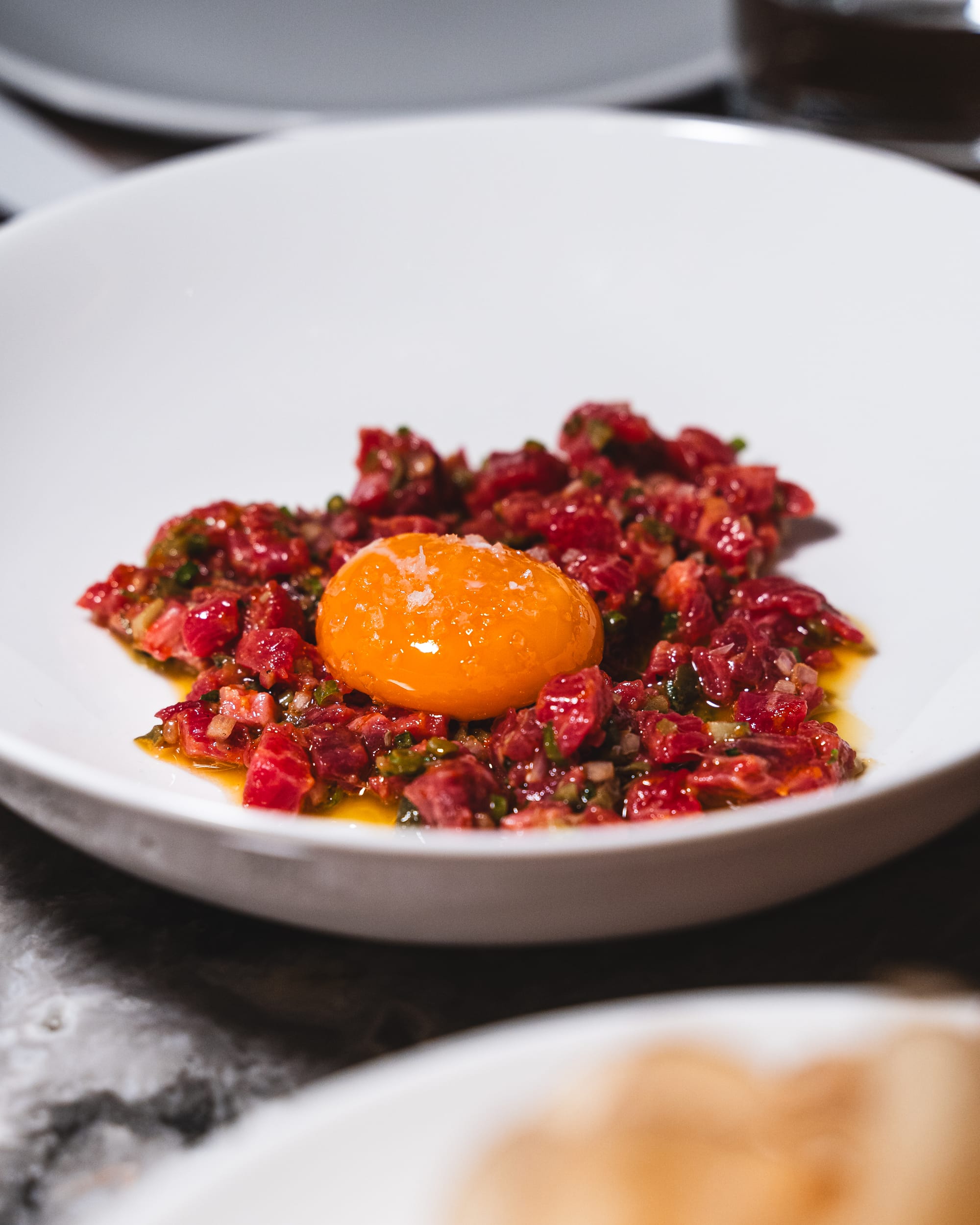 Close up of beef tartare with egg yolk