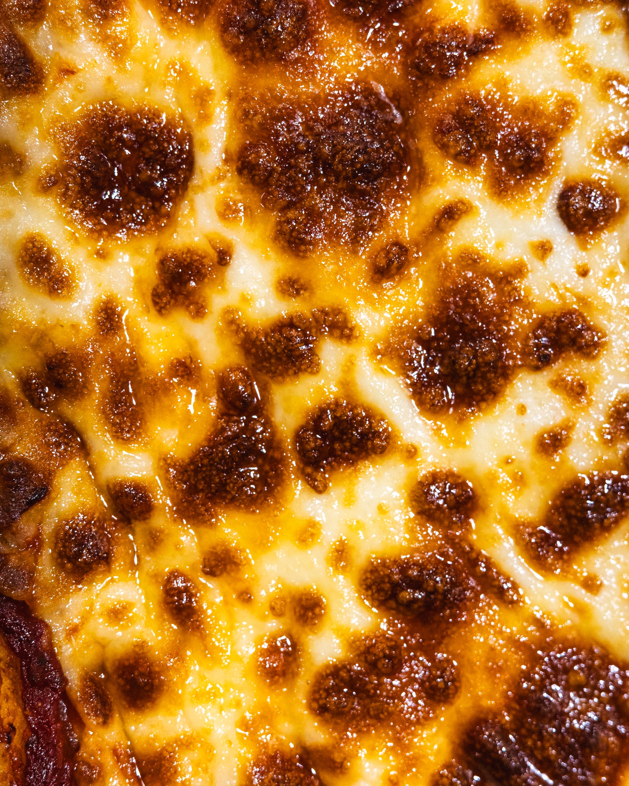 Close up of cheese on pizza