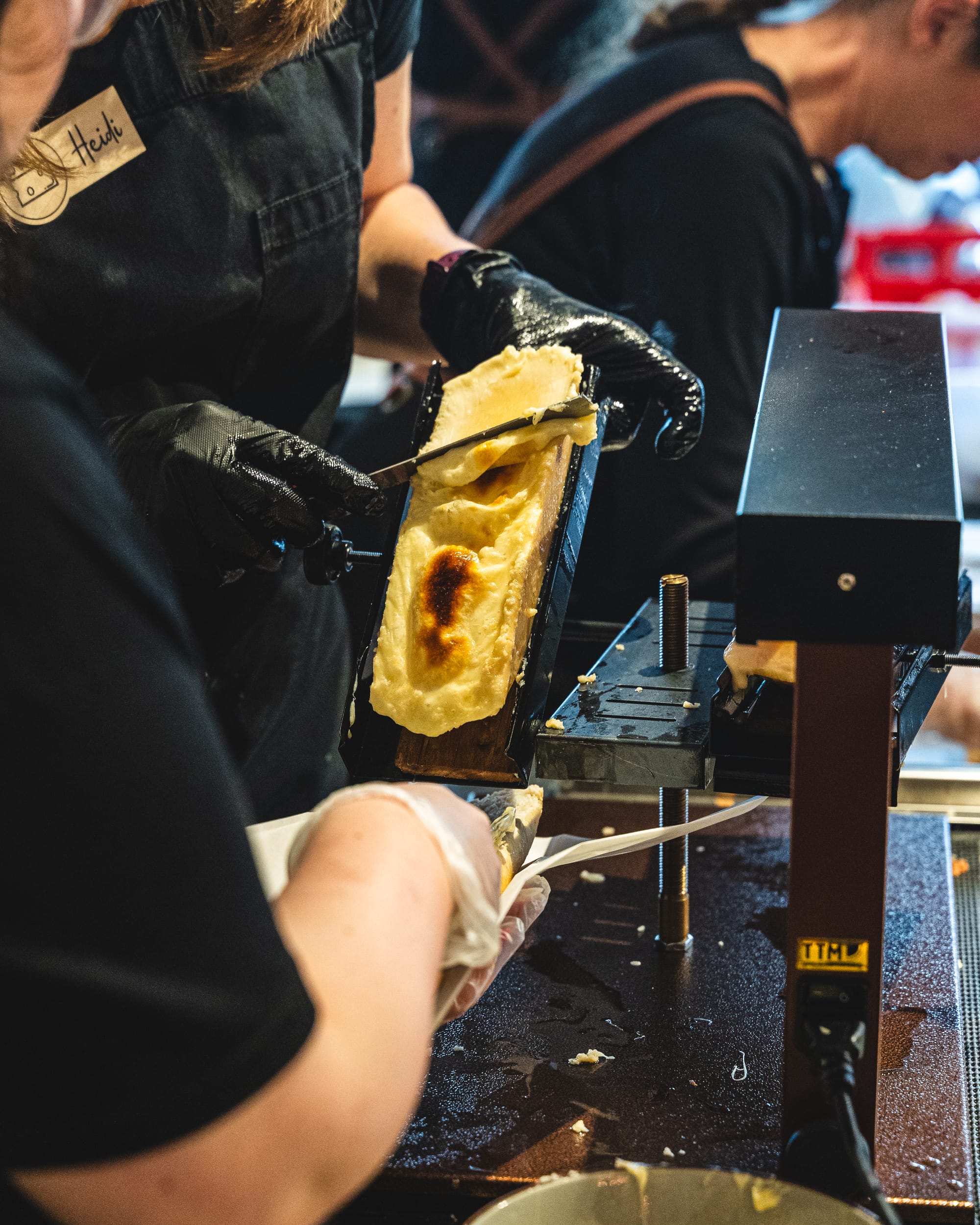 Raclette being carved