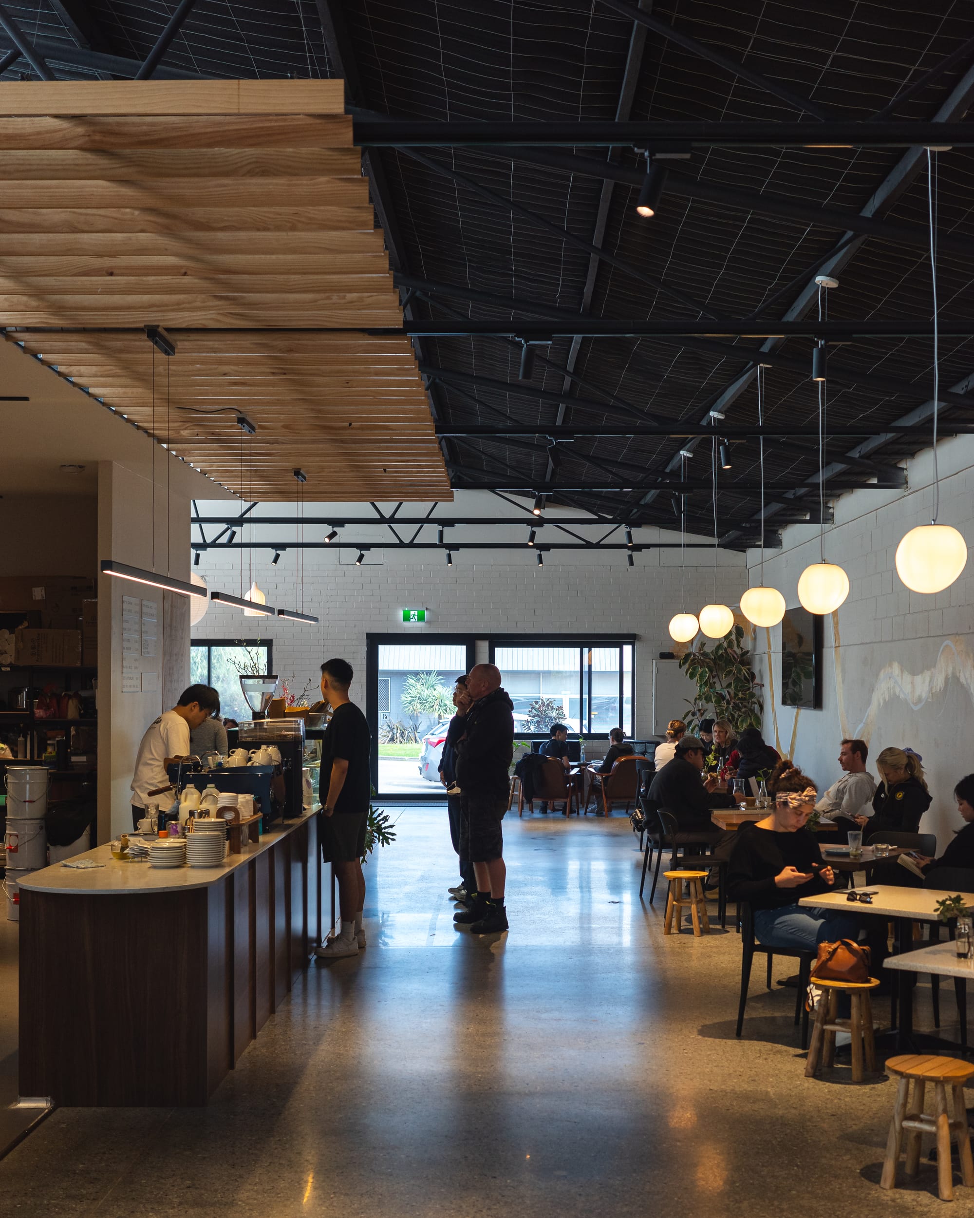 Interior of At Home Coffee showing customers dining inside