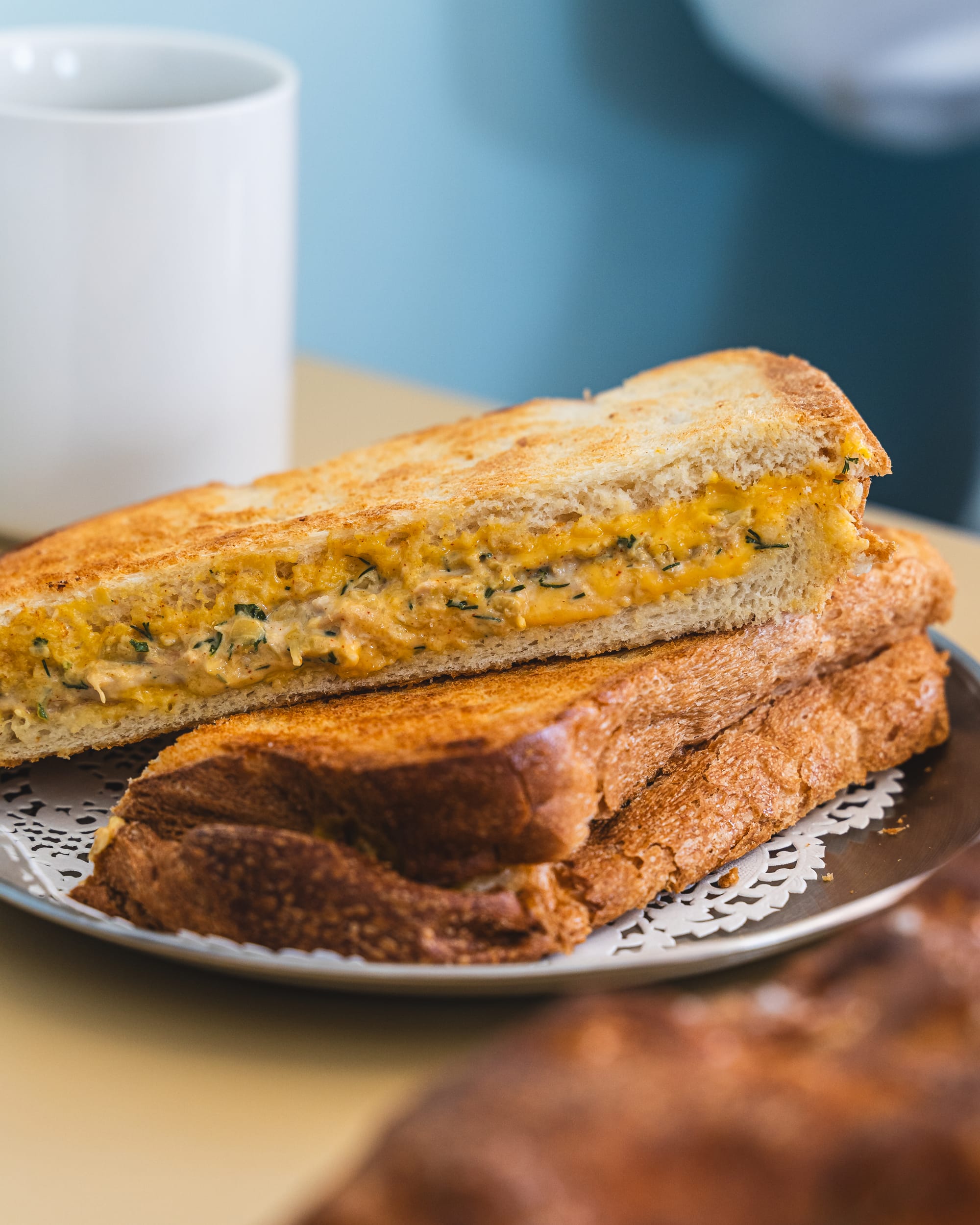 Close up of grilled tuna and cheese sandwich