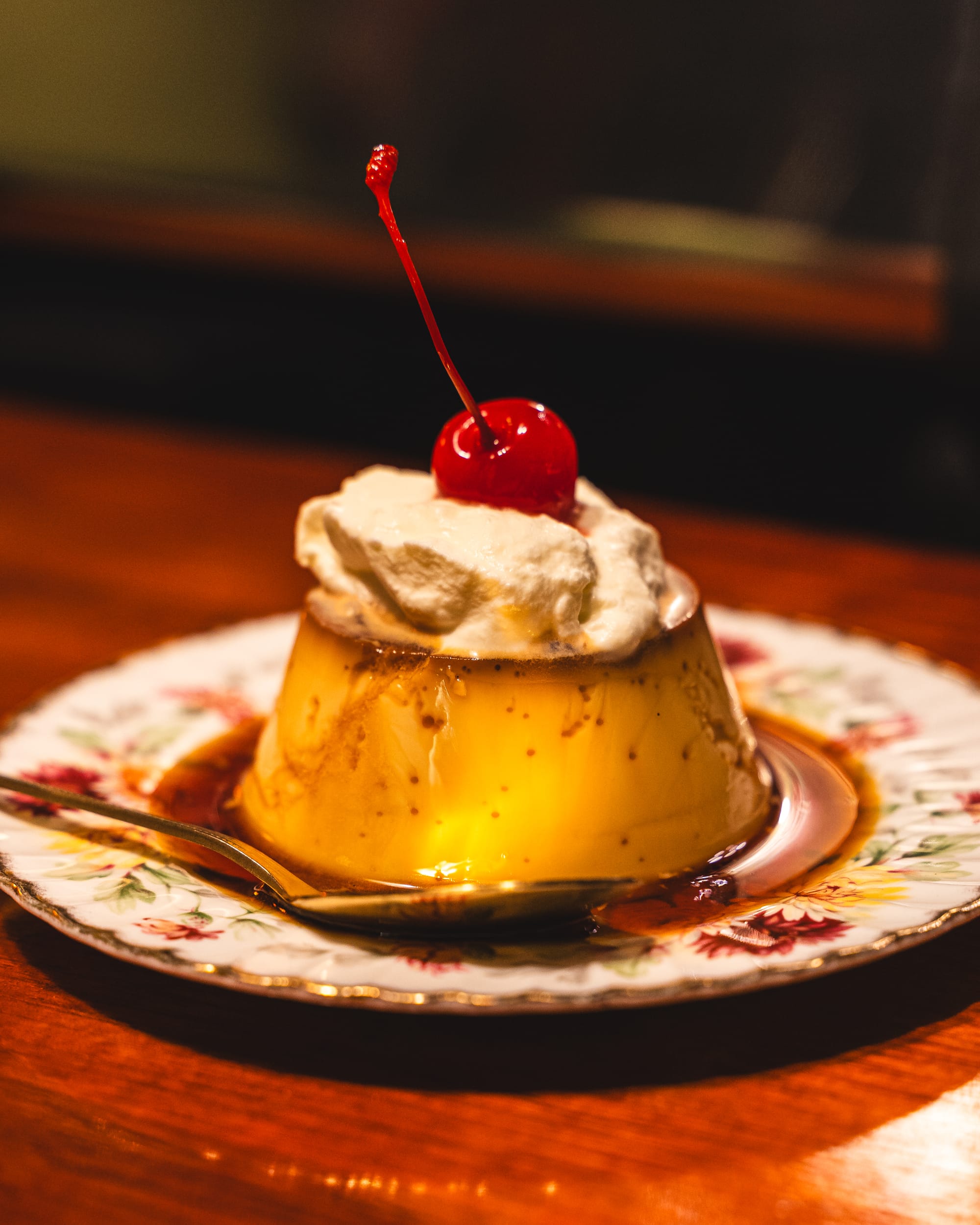 Close up of purin with cherry on top