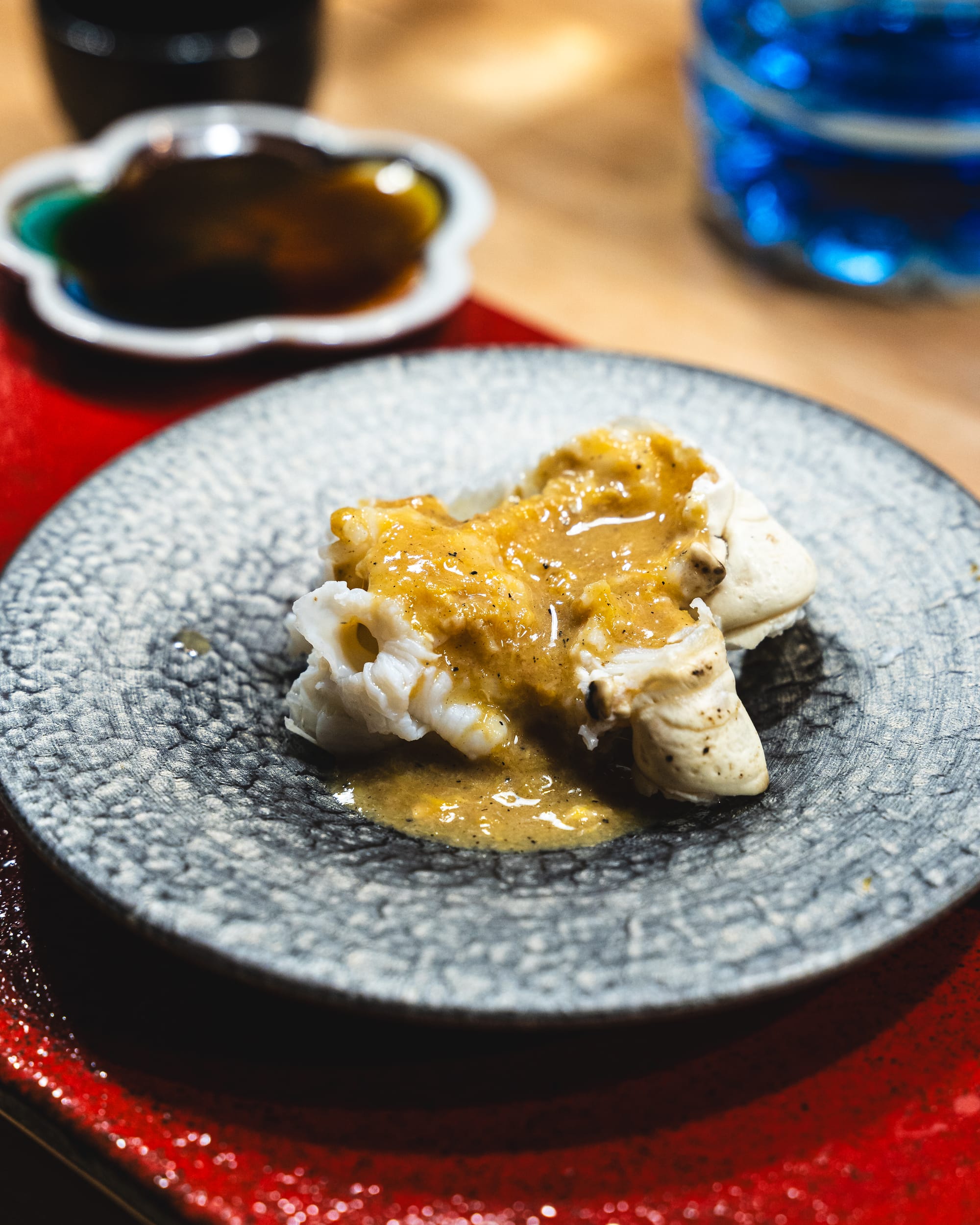 Close up of crab meat with uni sauce