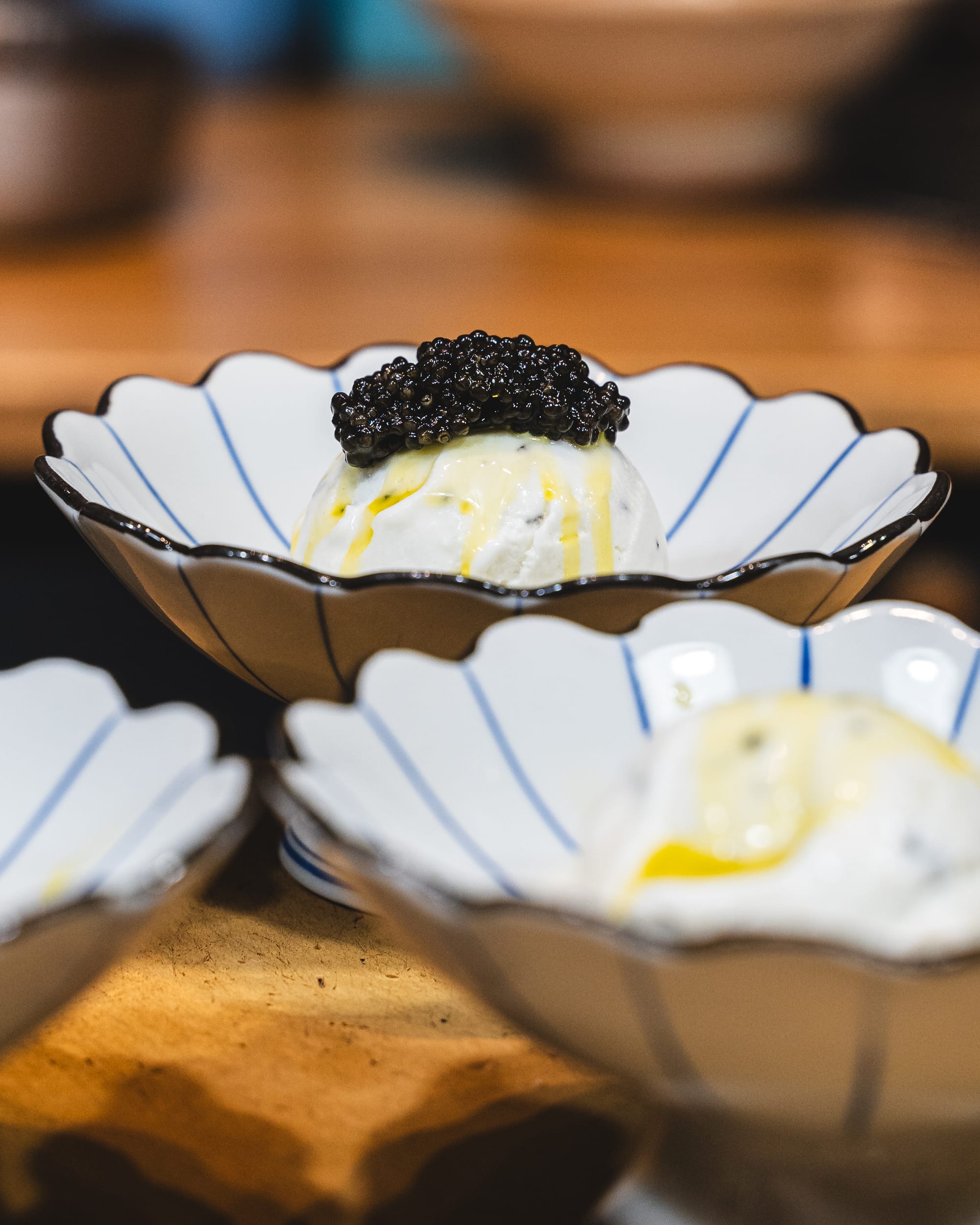 Close up of ice-cream with caviar on top