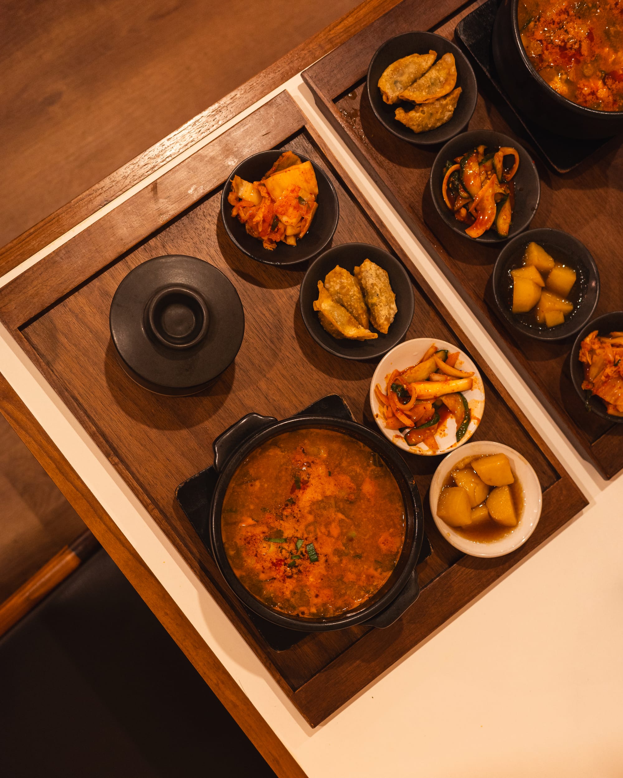 Top down shot of Yukgaejang and Korean sides