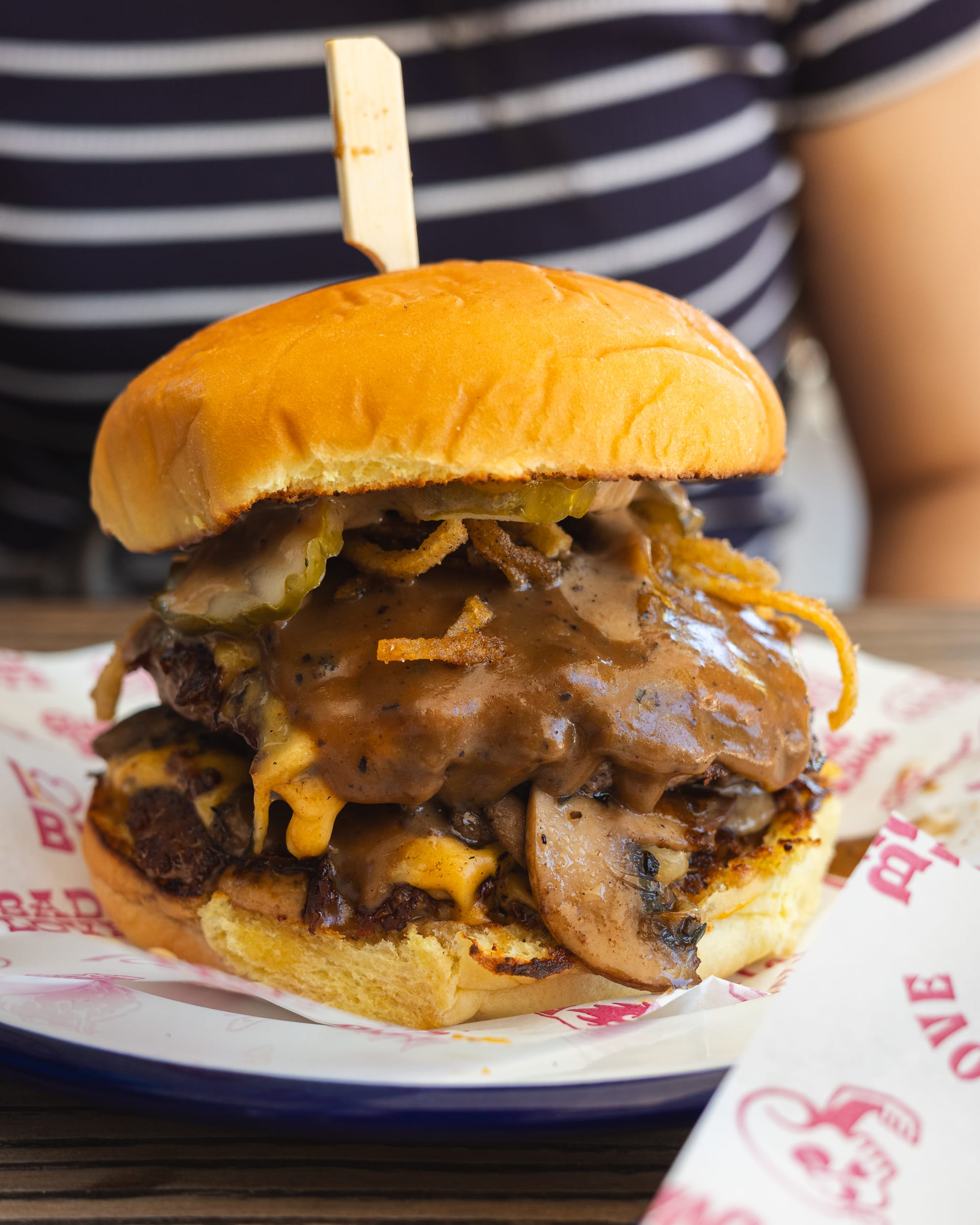 Close up of hamburger with peppercorn gravy